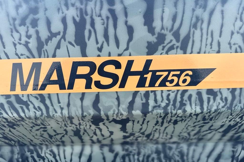 Tracker Grizzly 1756 T Marsh 2026 model with camouflage pattern and bold lettering.