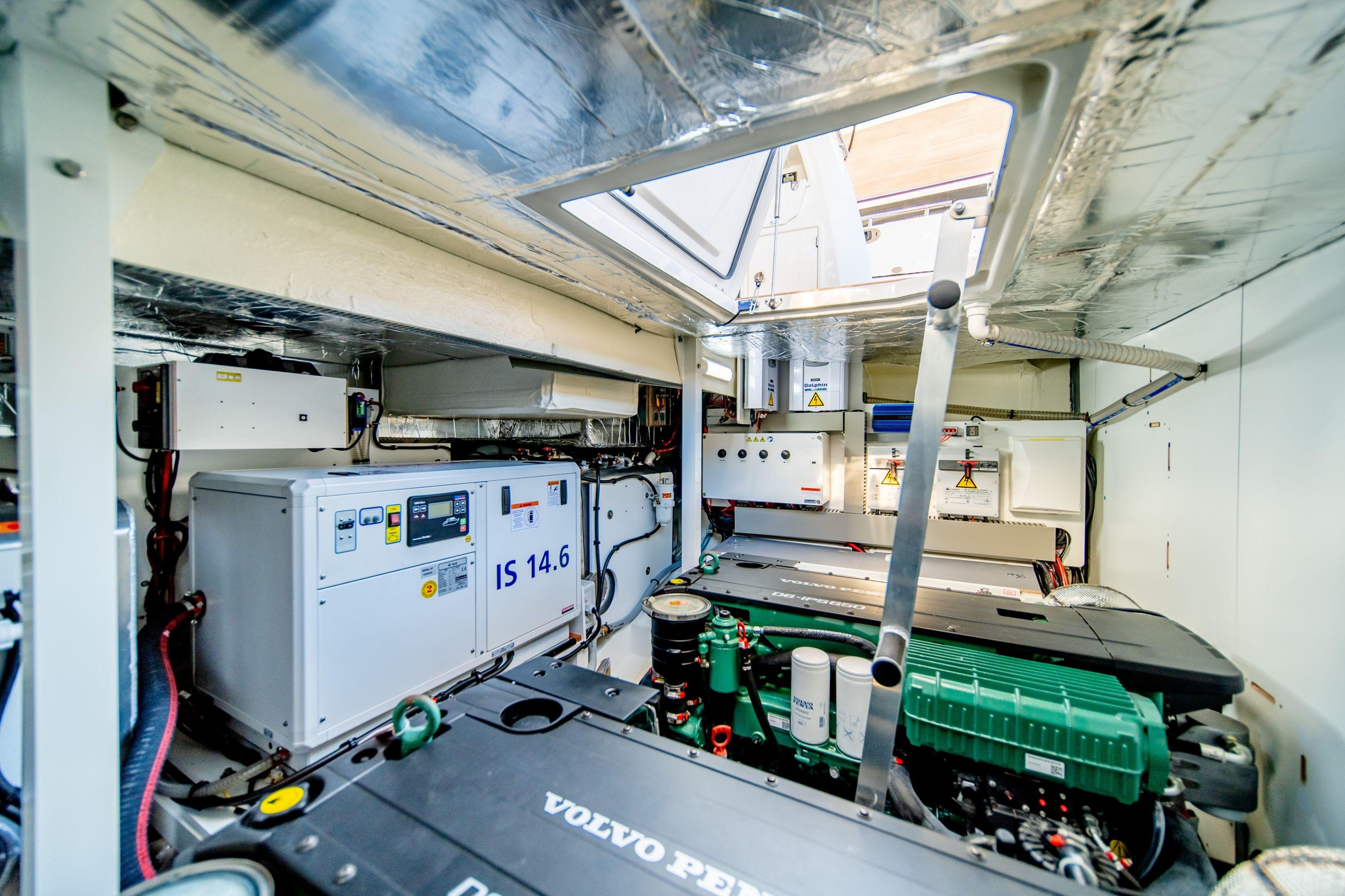 Engine room of a 2026 Prestige 520 yacht, featuring advanced machinery and equipment.