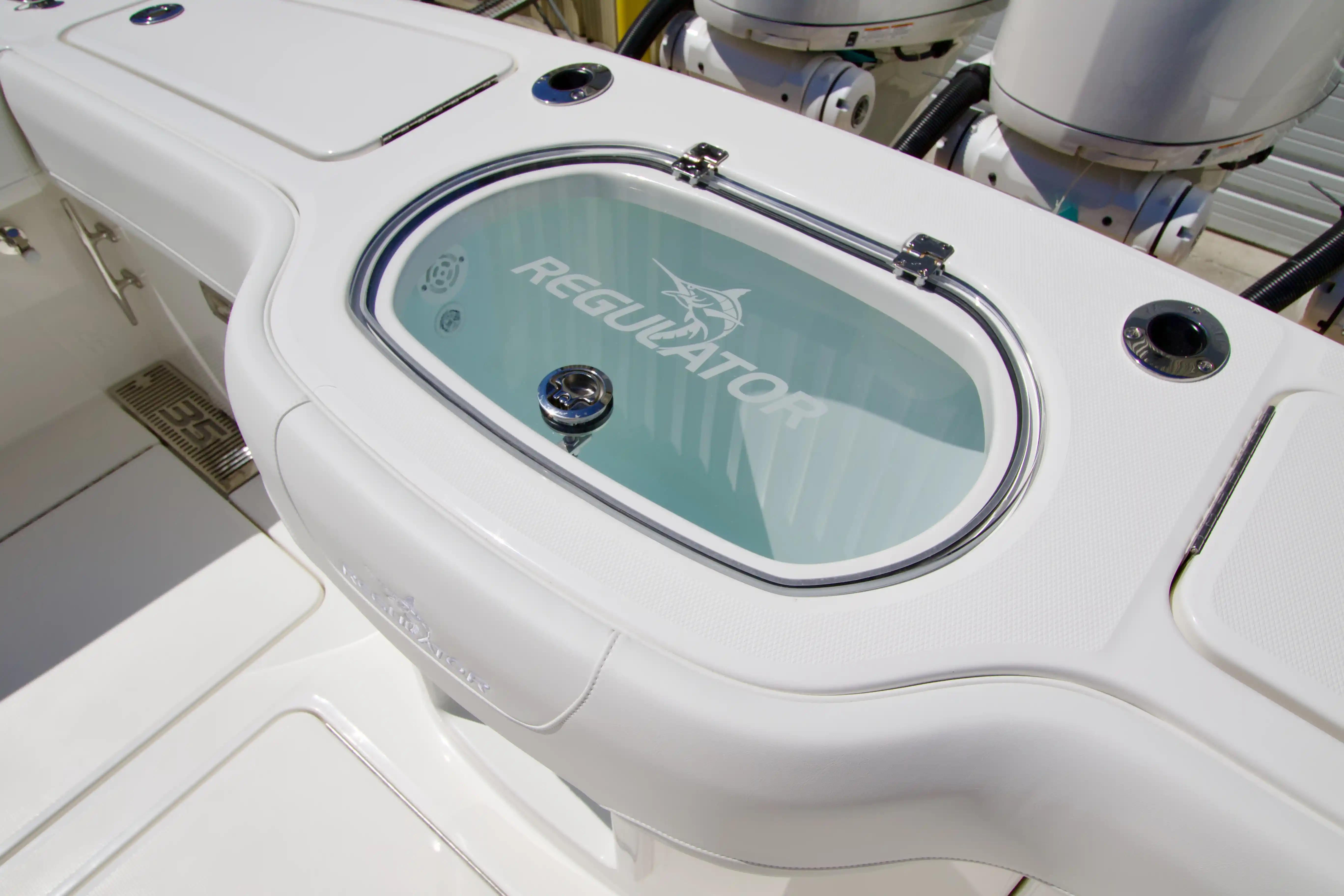 2027 Regulator 35 boat livewell with logo, showcasing sleek design and functionality.