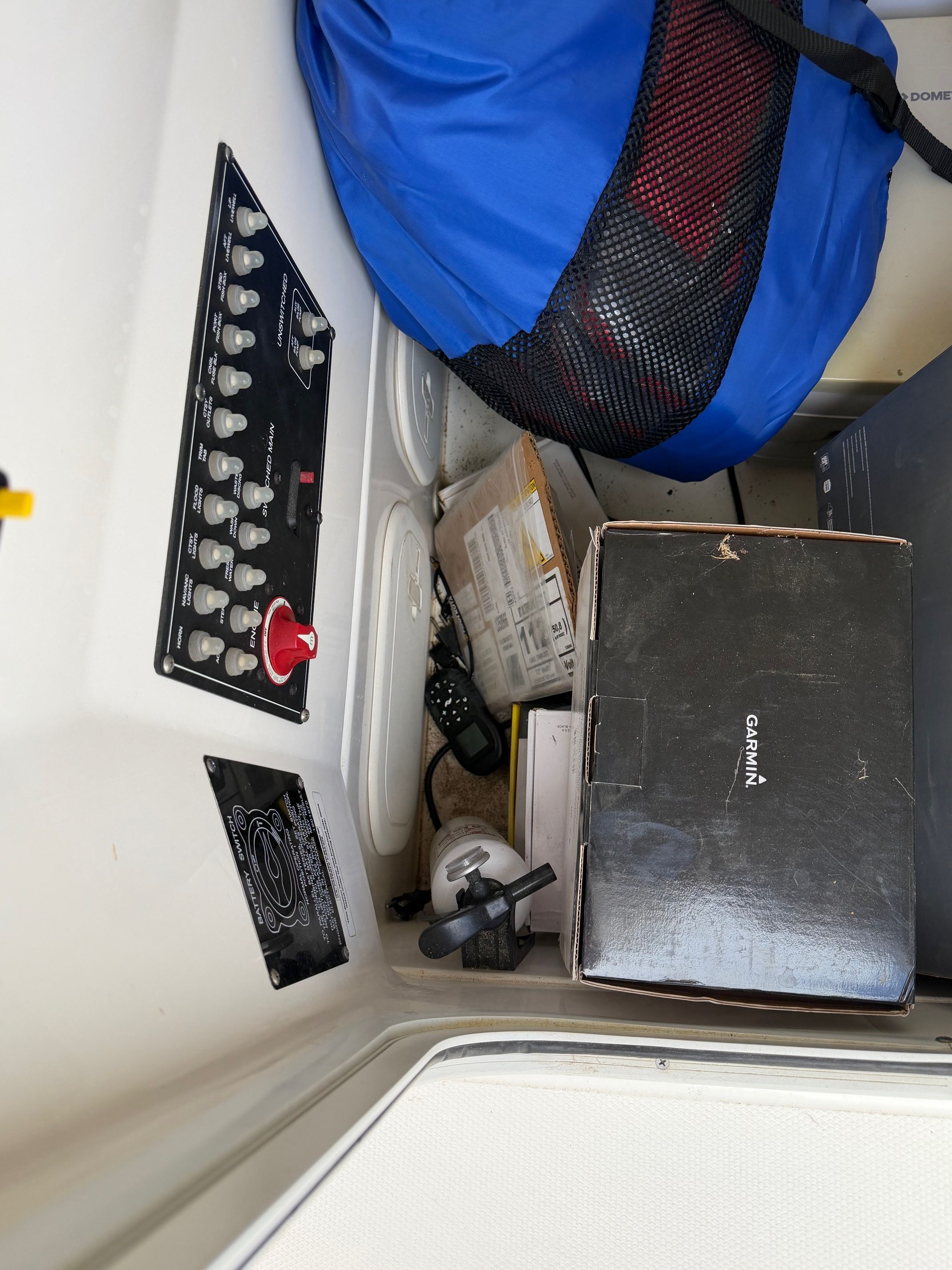 Interior of a Boston Whaler 230 Outrage boat, electronics and gear.