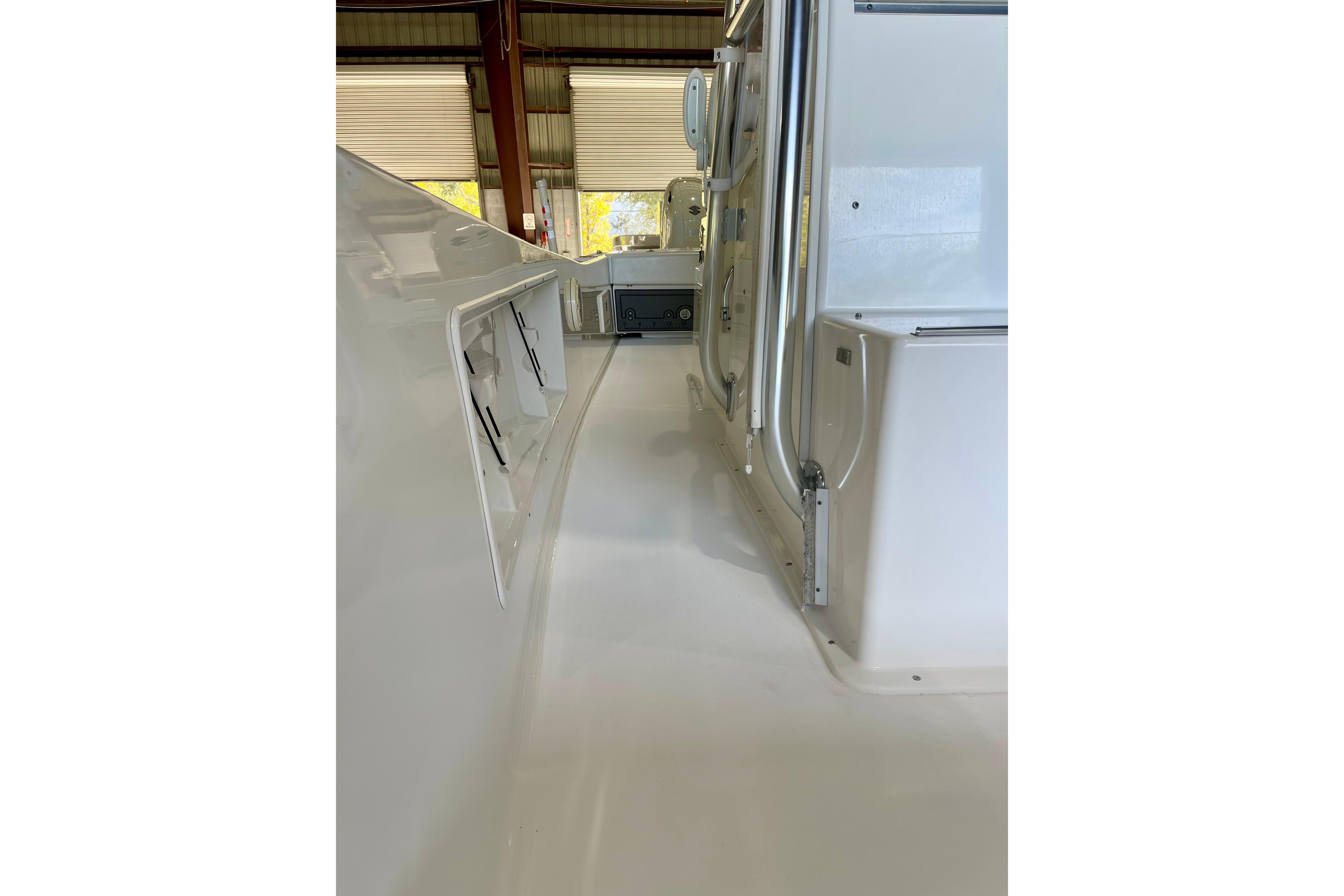 2025 Ocean Master 296 Center Console interior view in a boatyard.
