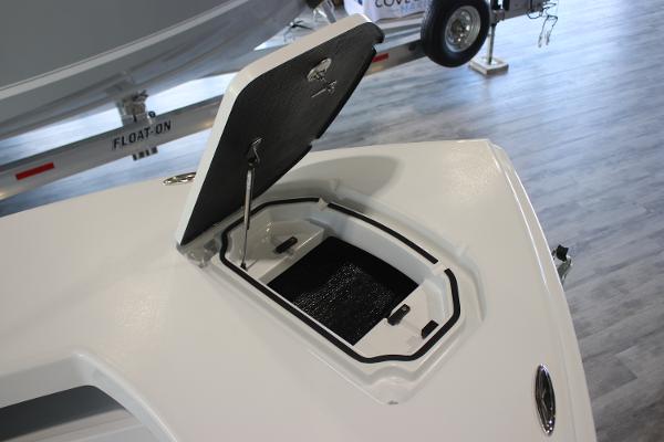 2025 East Cape 25 Open boat with open storage compartment on display.