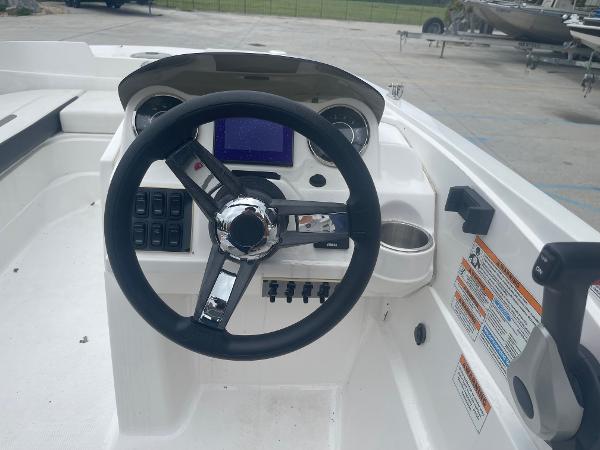 2022 Hurricane SS185 OB boat dashboard with steering wheel and control panel.