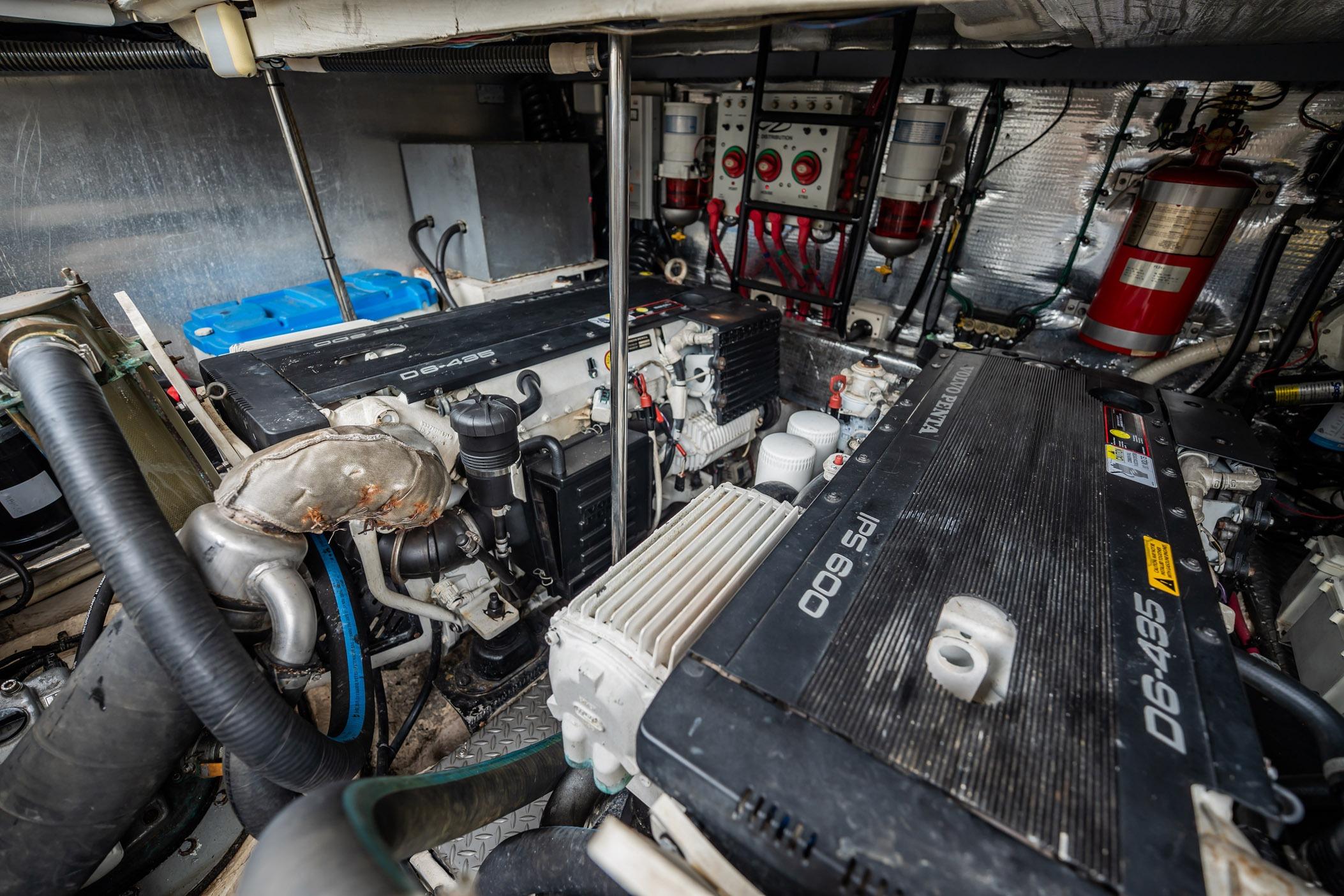 Engine room of a 2008 Regal Commodore 4460 yacht, featuring Volvo Penta engines.