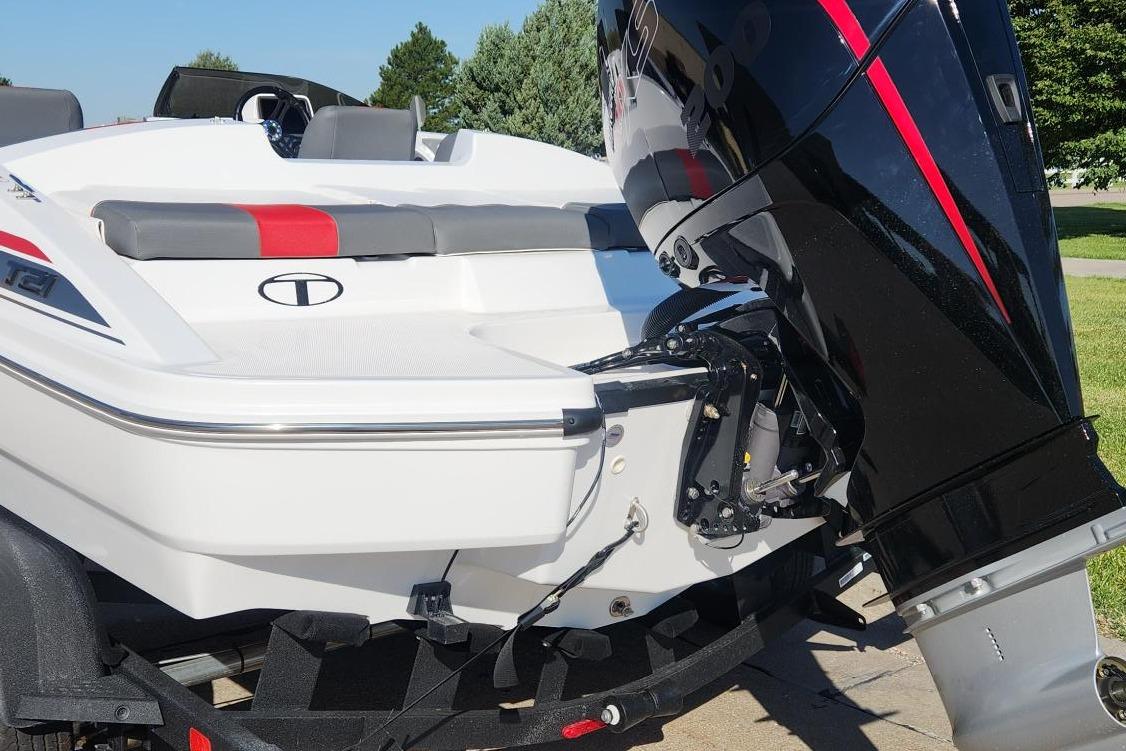 2026 Tahoe T21 boat with powerful outboard motor, sleek design, and modern seating.