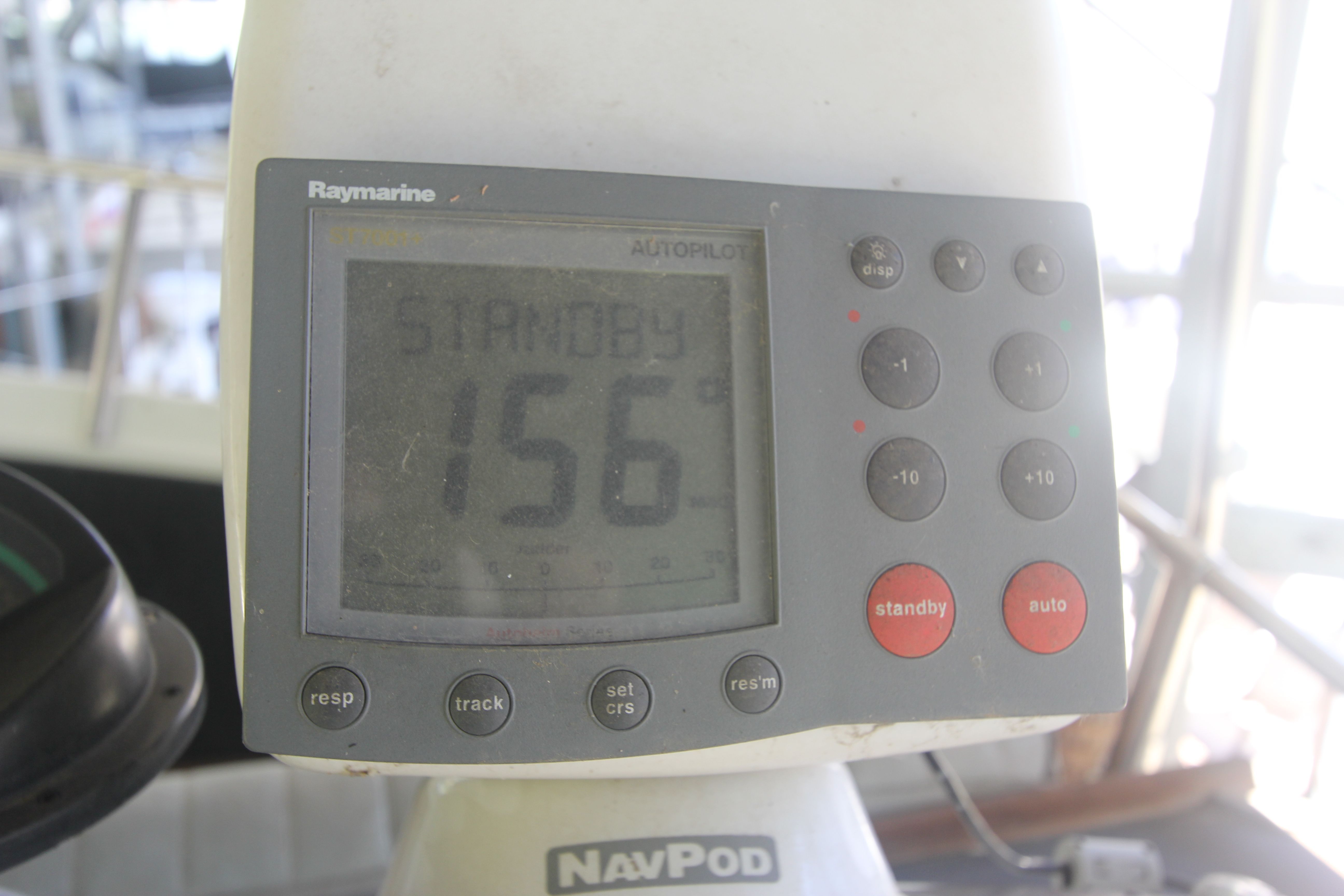 A Raymarine autopilot displays 156 degrees in standby mode.