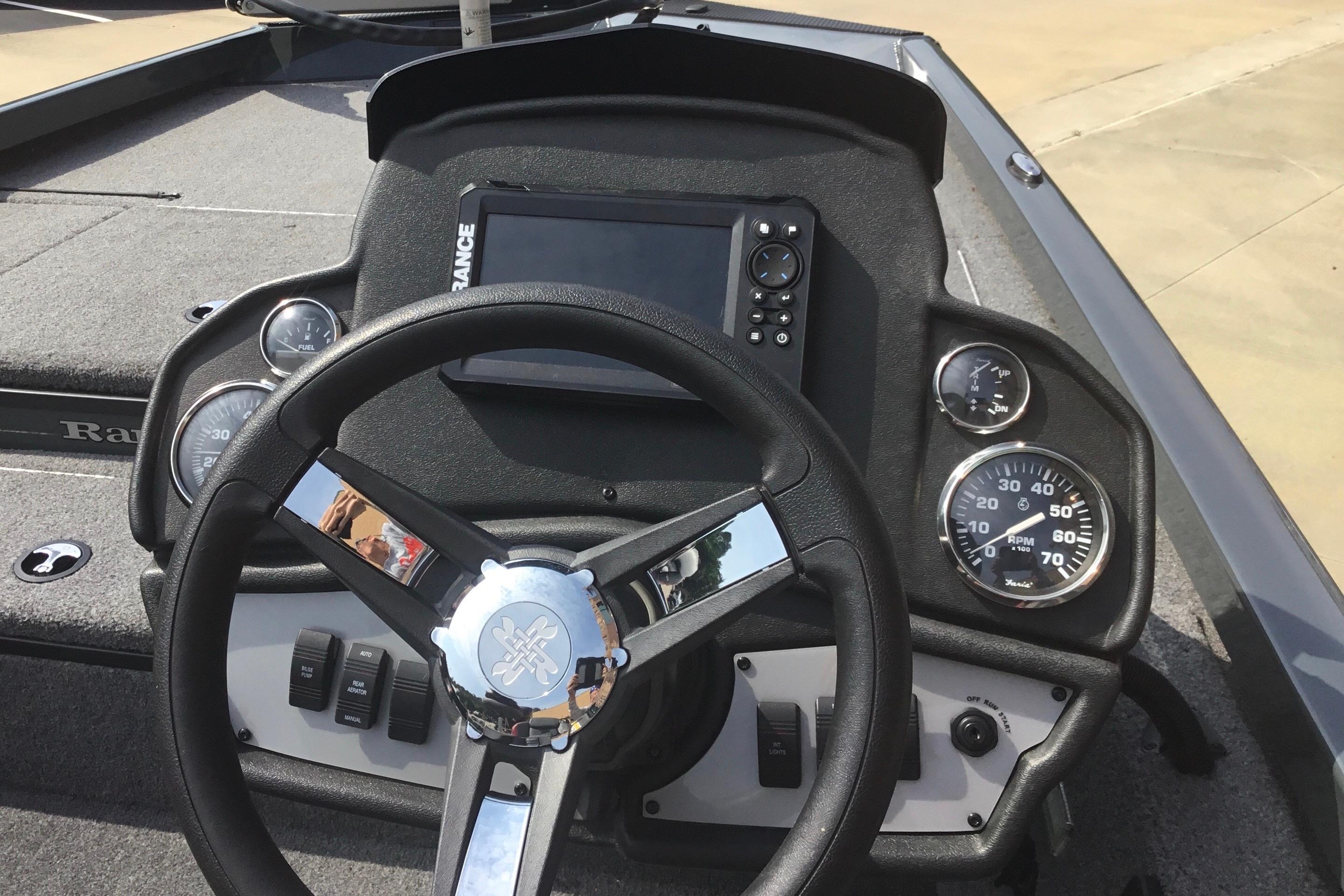 2025 Ranger RT178 boat dashboard with steering wheel and instrument panel.