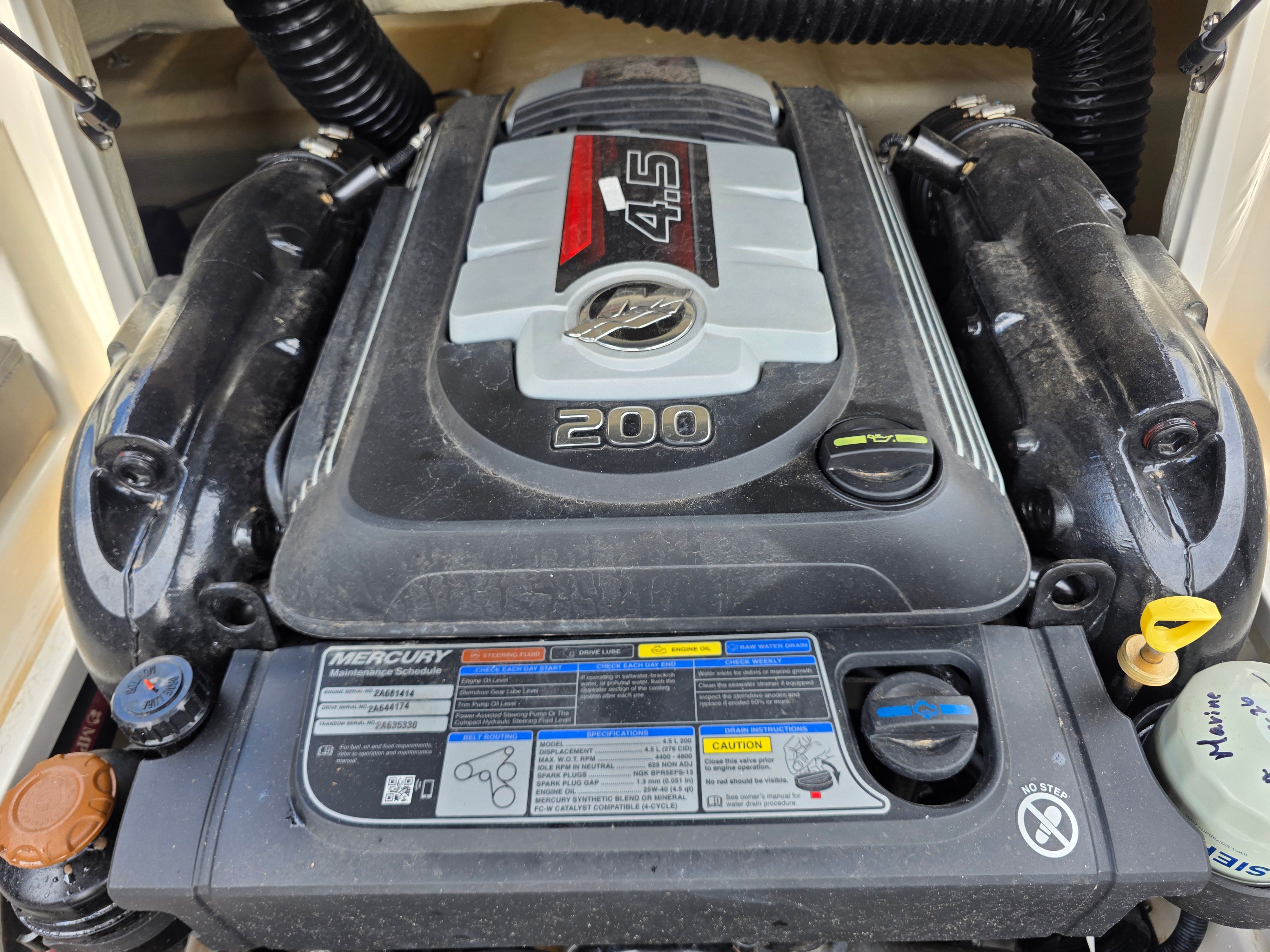 Engine compartment of a 2021 Bayliner VR4 Bowrider I/O with a 4.5-liter Mercury engine.