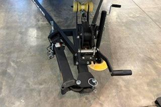 Trailer hitch of 2026 Tracker Pro Team 175 on concrete floor.