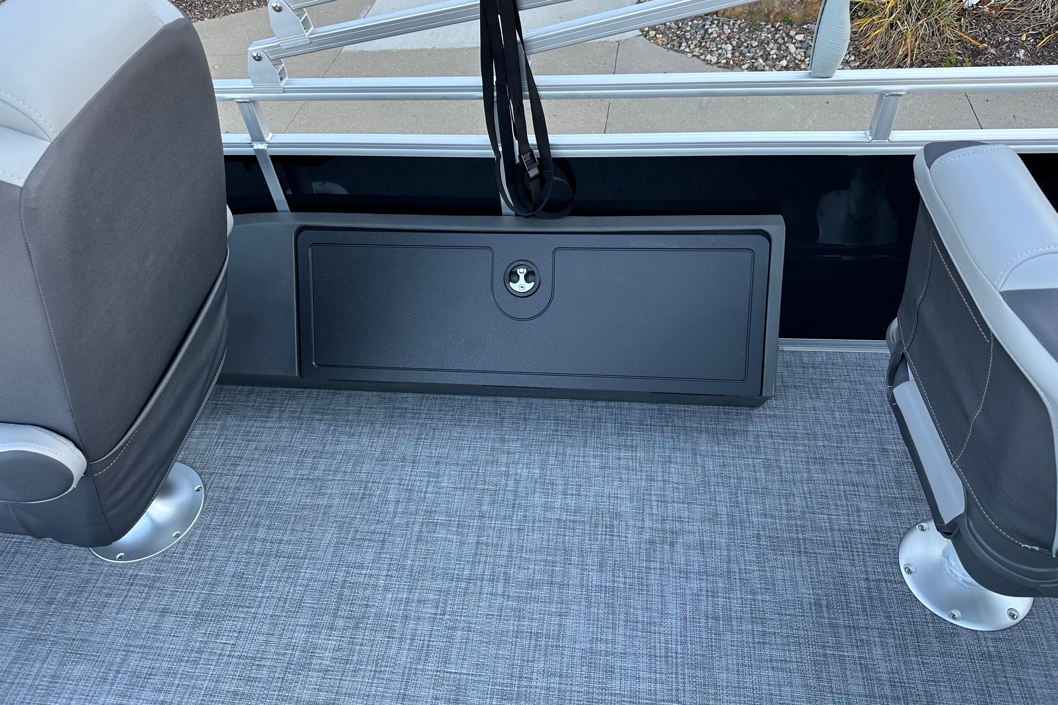 2026 Sun Tracker SportFish 22 DLX interior with gray seating and flooring.