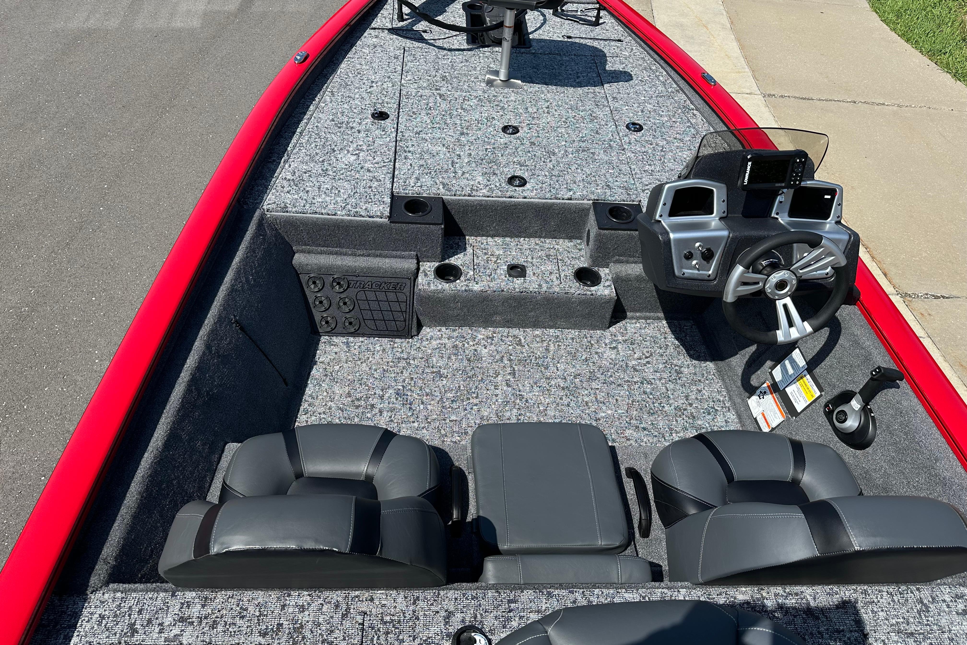 2026 Tracker Pro Team 195 boat interior with steering console and seating.