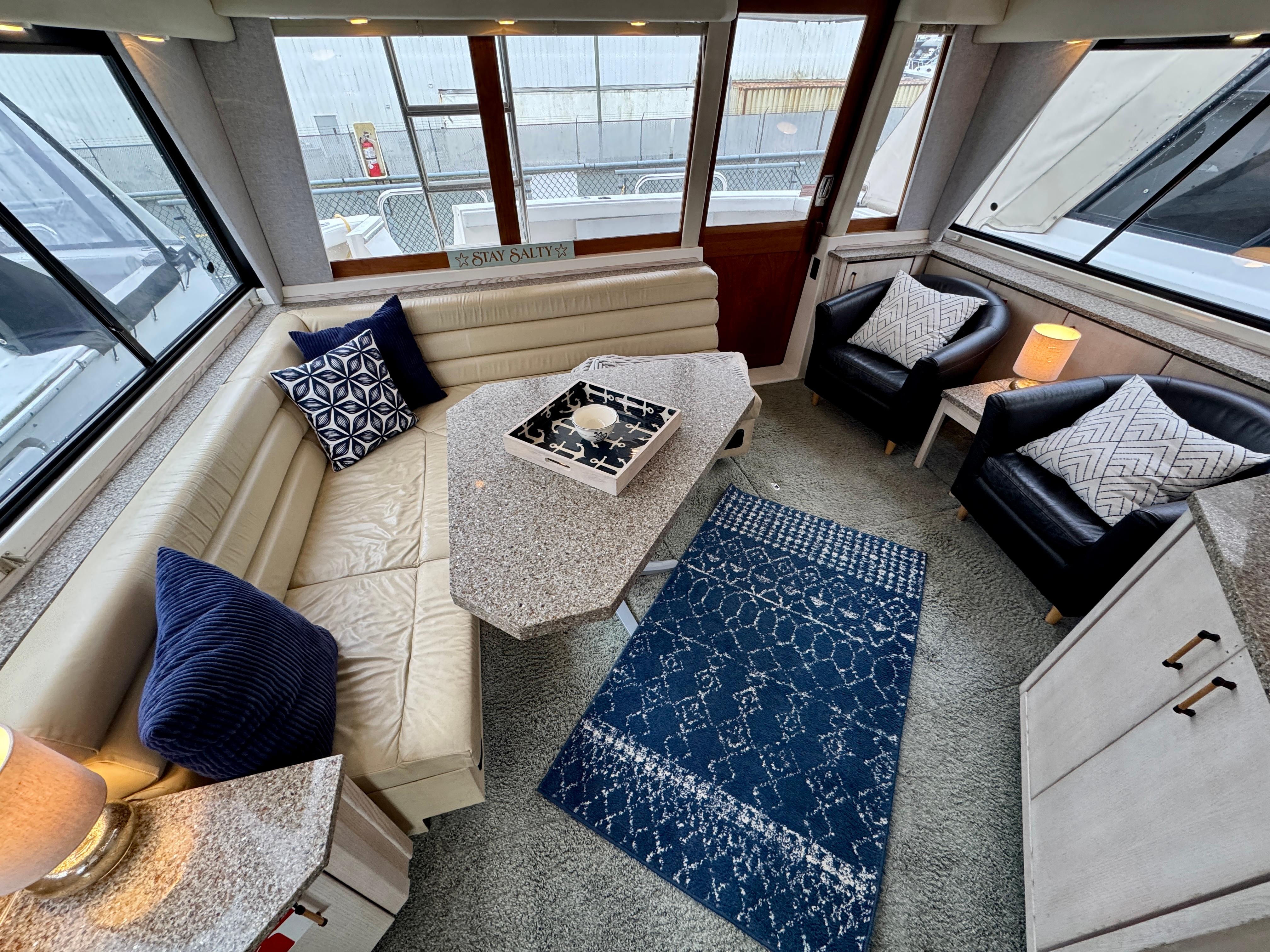 Luxurious interior of 1996 Bayliner 4788 Pilothouse with elegant seating and decor.
