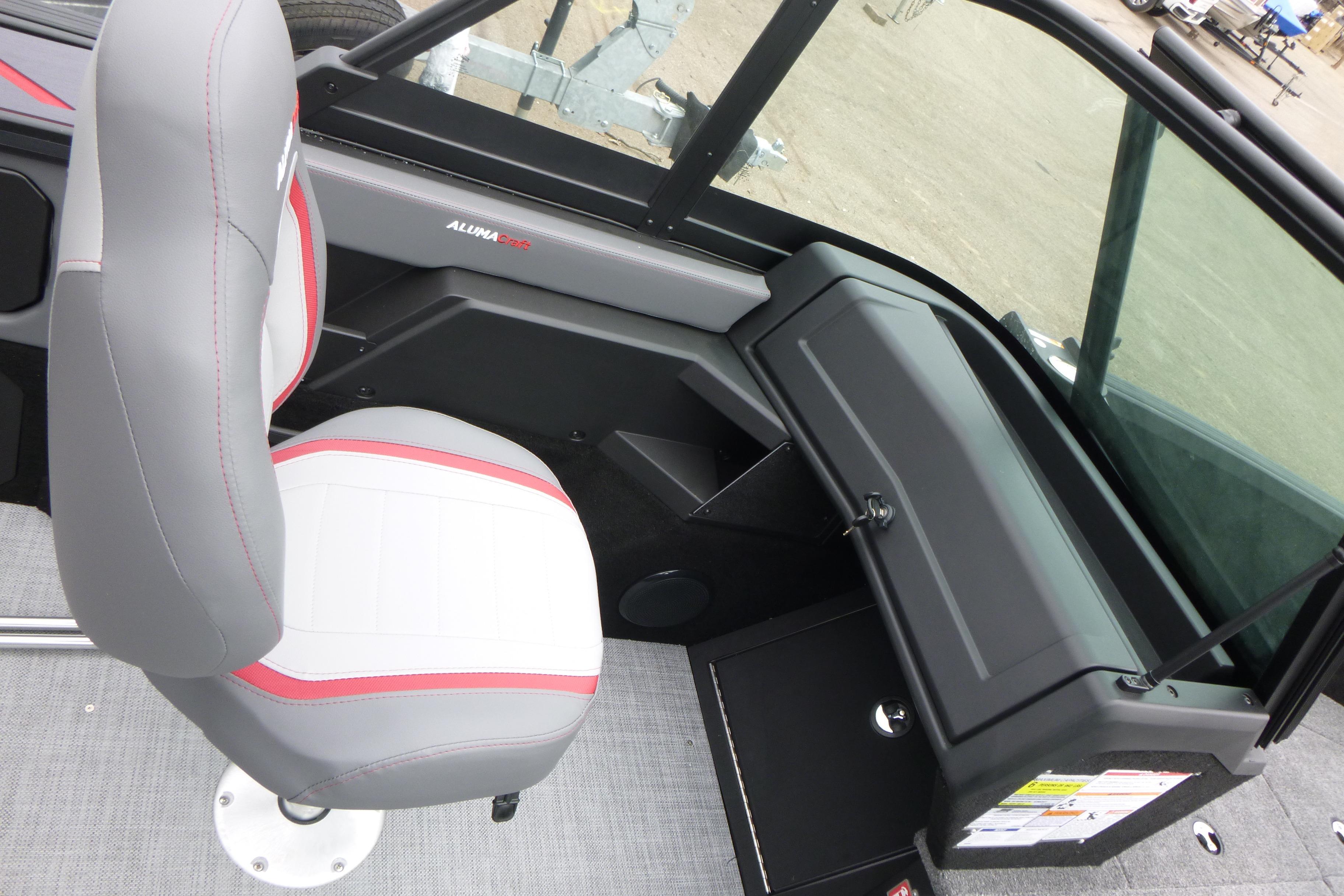 2025 Alumacraft Trophy 185X Sport interior with gray and red seating.