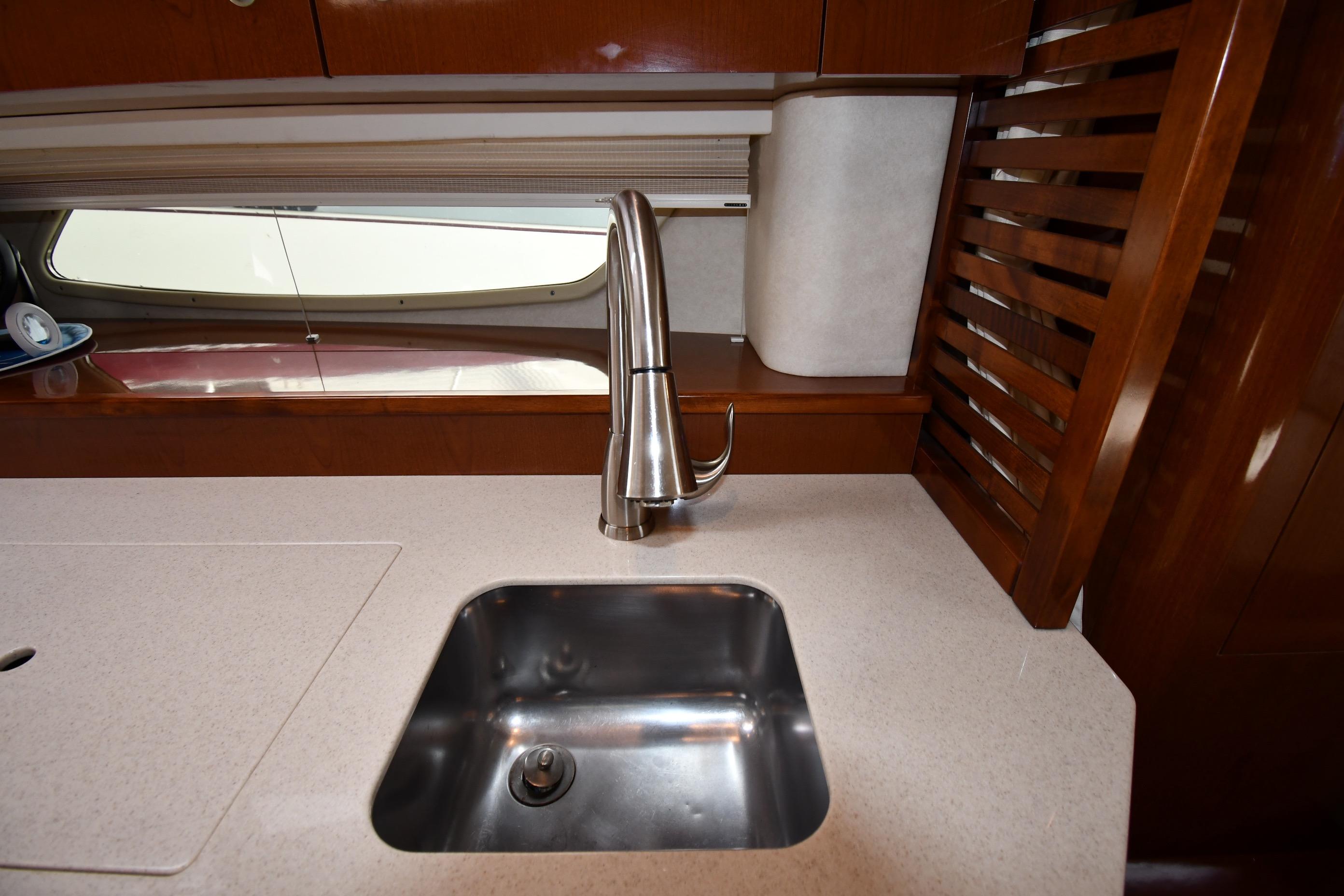 Luxurious kitchen sink area on 2008 Sea Ray Sundancer 350 yacht.