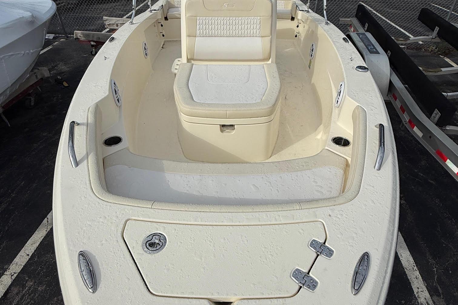 2026 Scout 188 Sportfish boat interior with seating and storage compartments.