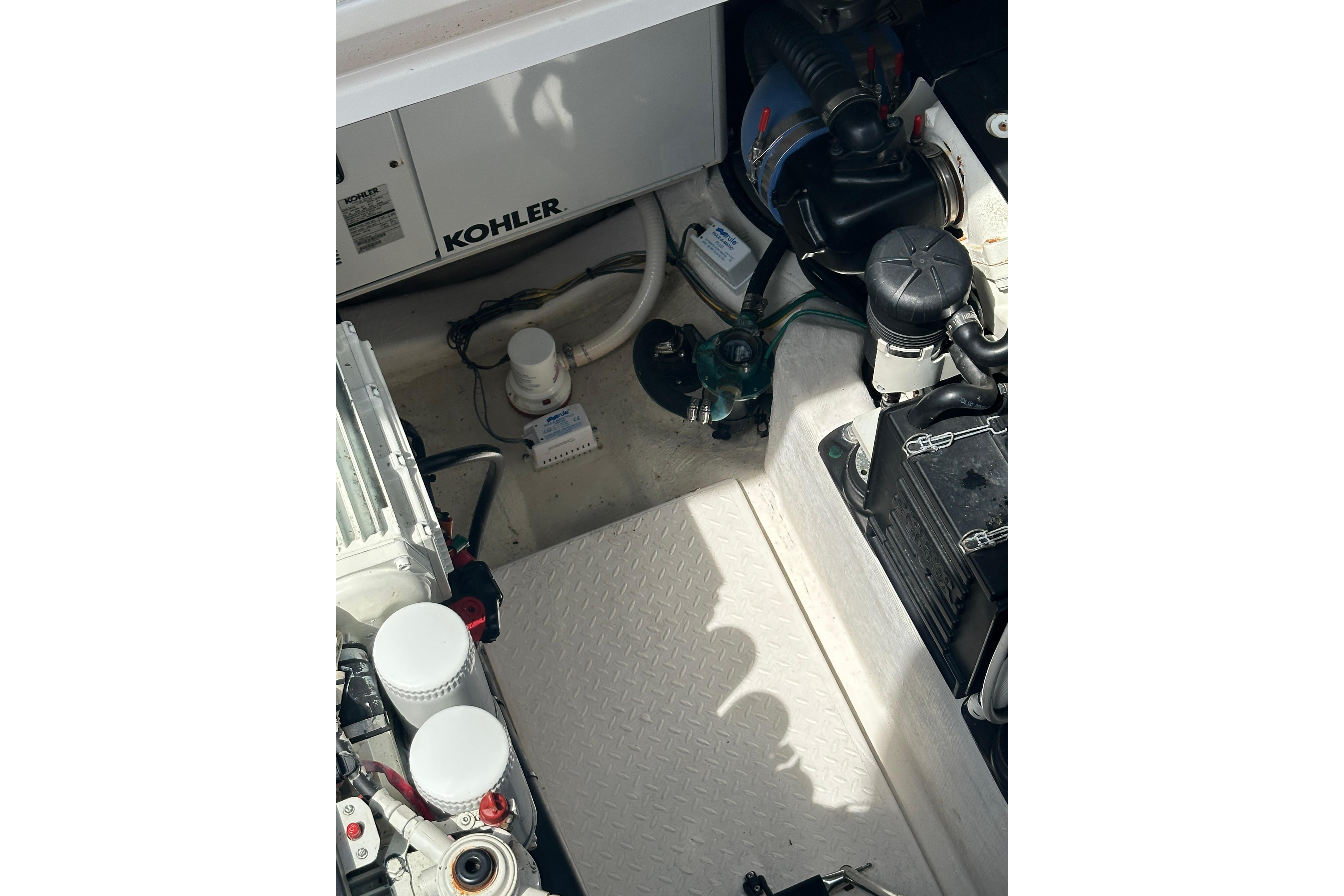 Engine compartment of 2013 Sabre 38 Salon Express with Kohler generator visible.