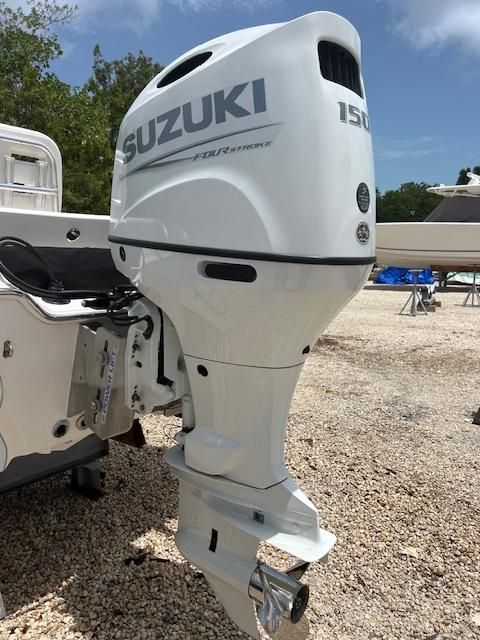 Suzuki 150 HP outboard motor on Blue Wave 2200 PureBay boat.