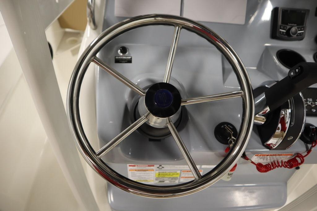 Steering wheel and controls of 2026 Bayliner Trophy T20CC boat.