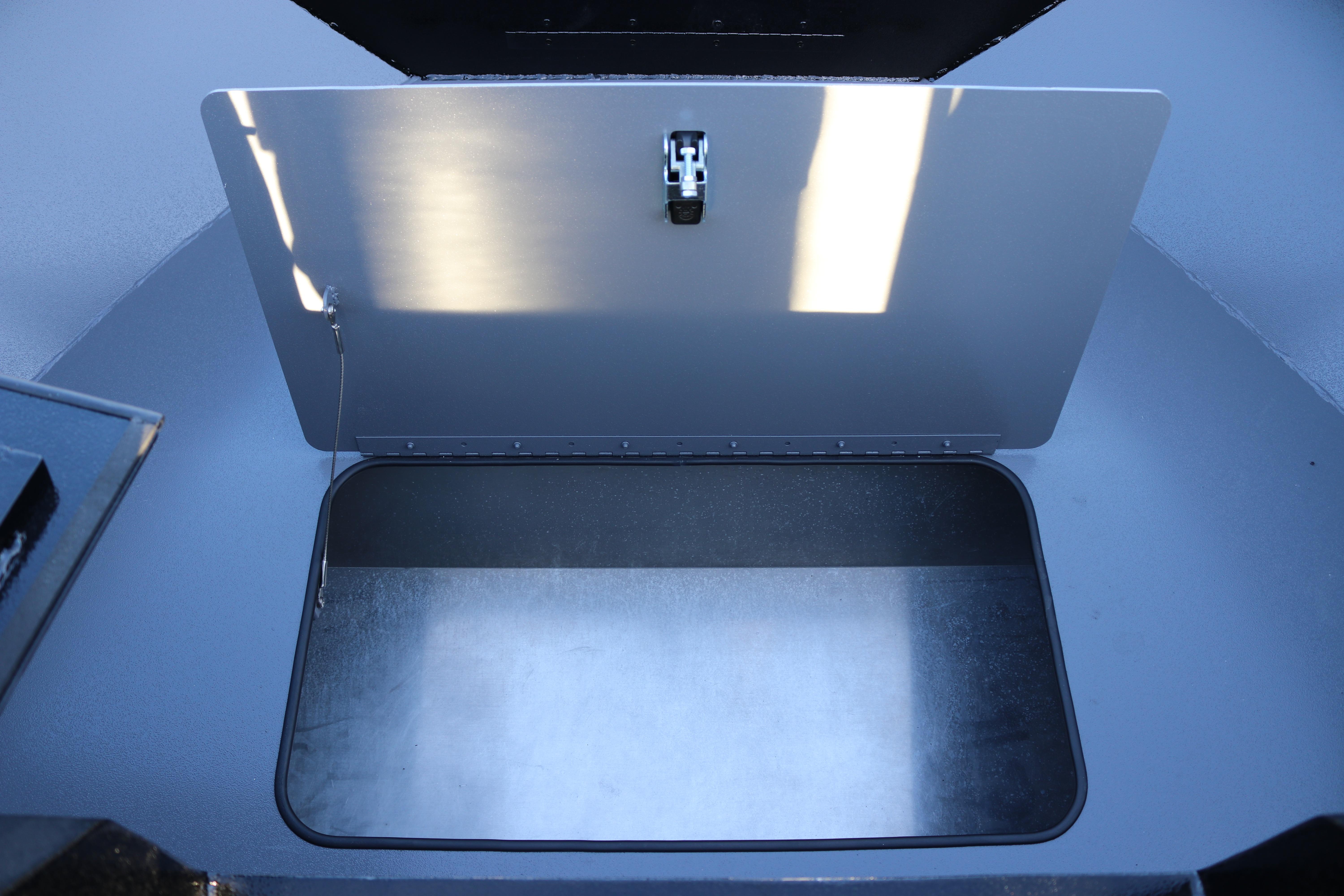 Open storage compartment in 2026 Alumaweld Stryker X202 boat.