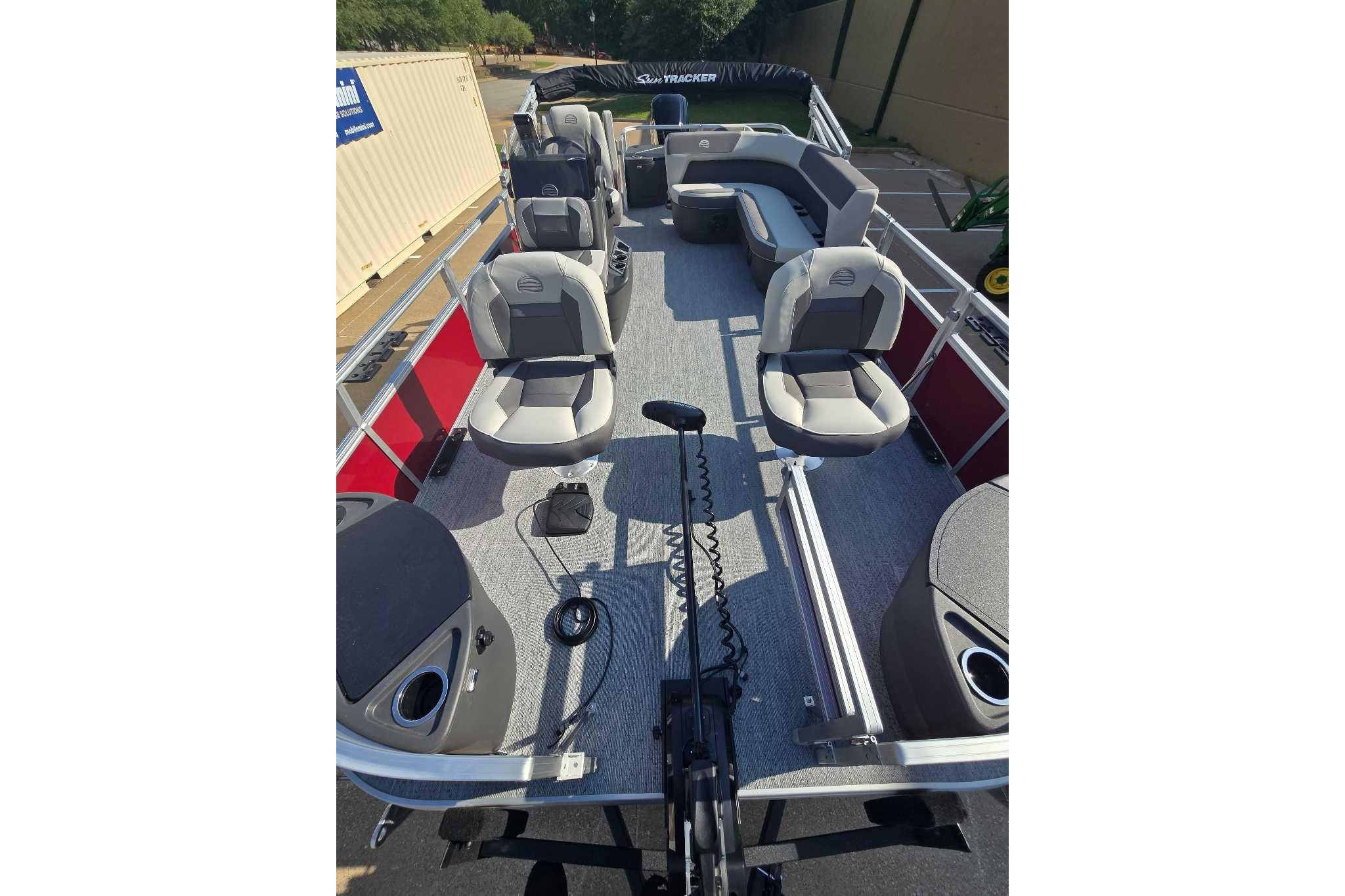 2026 Sun Tracker Bass Buggy 18 DLX pontoon boat with spacious seating and modern design.