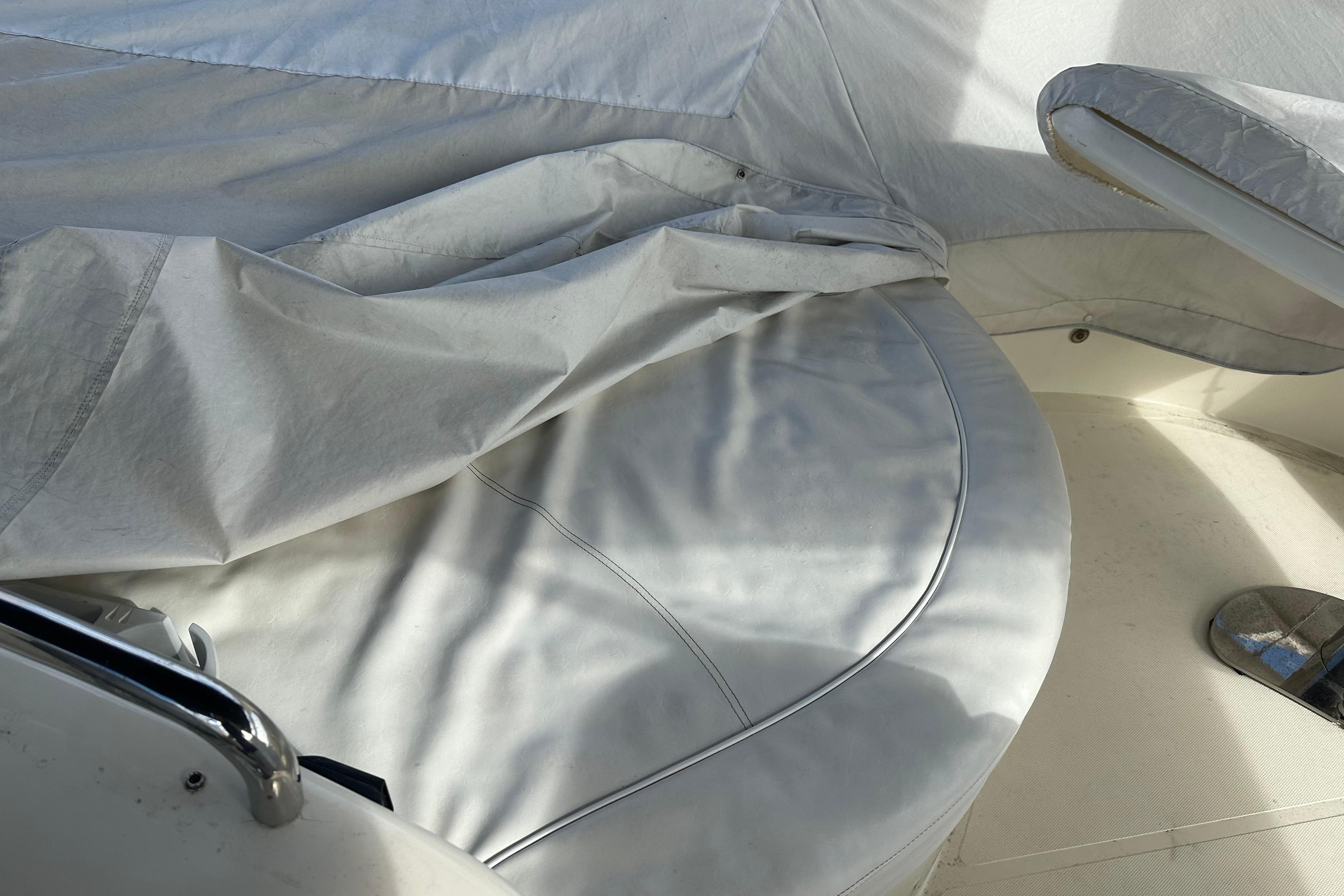 2004 Azimut 55E yacht interior with covered seating area.