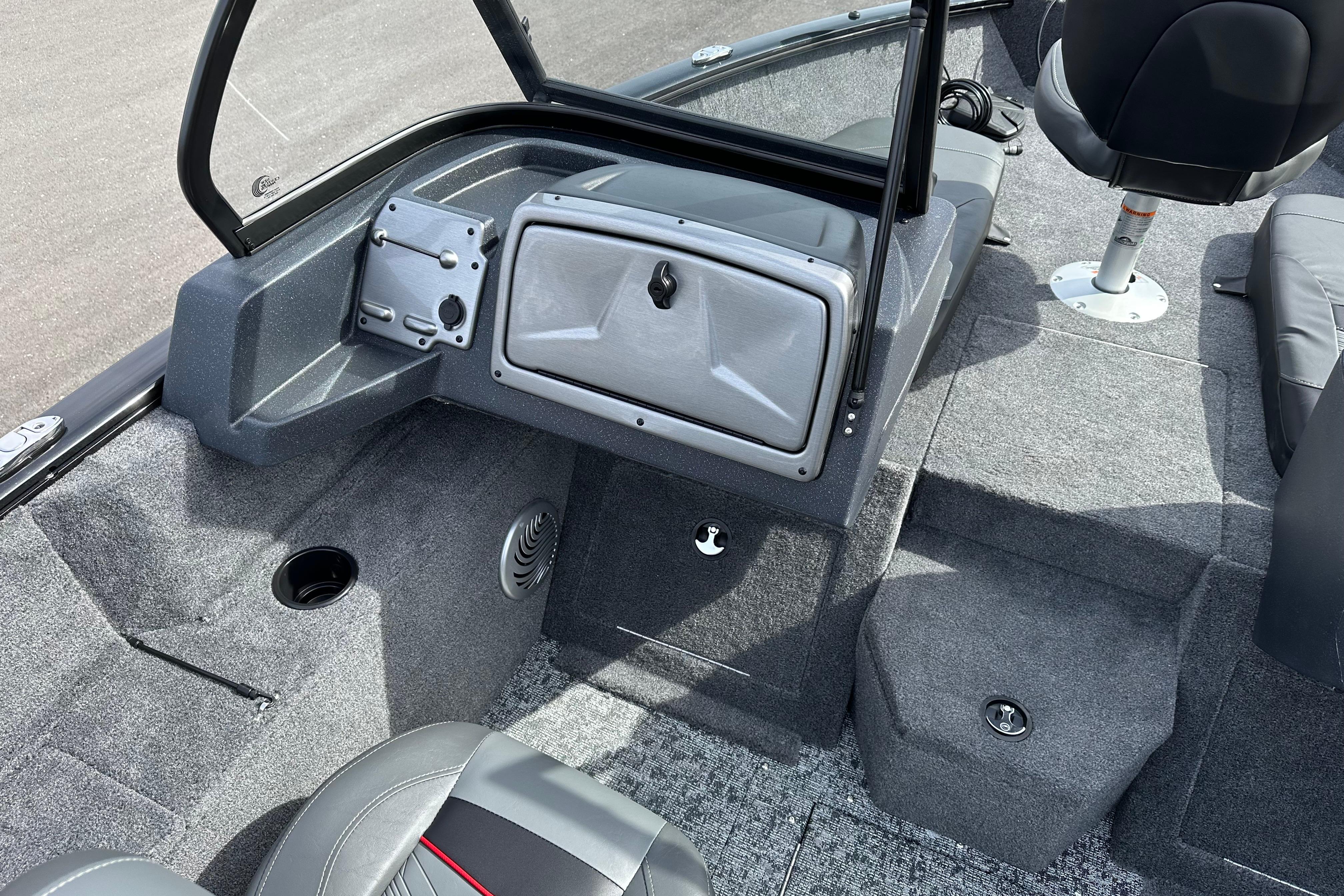 Interior of 2026 Tracker Pro Guide V-175 Combo boat, featuring seating and storage compartments.