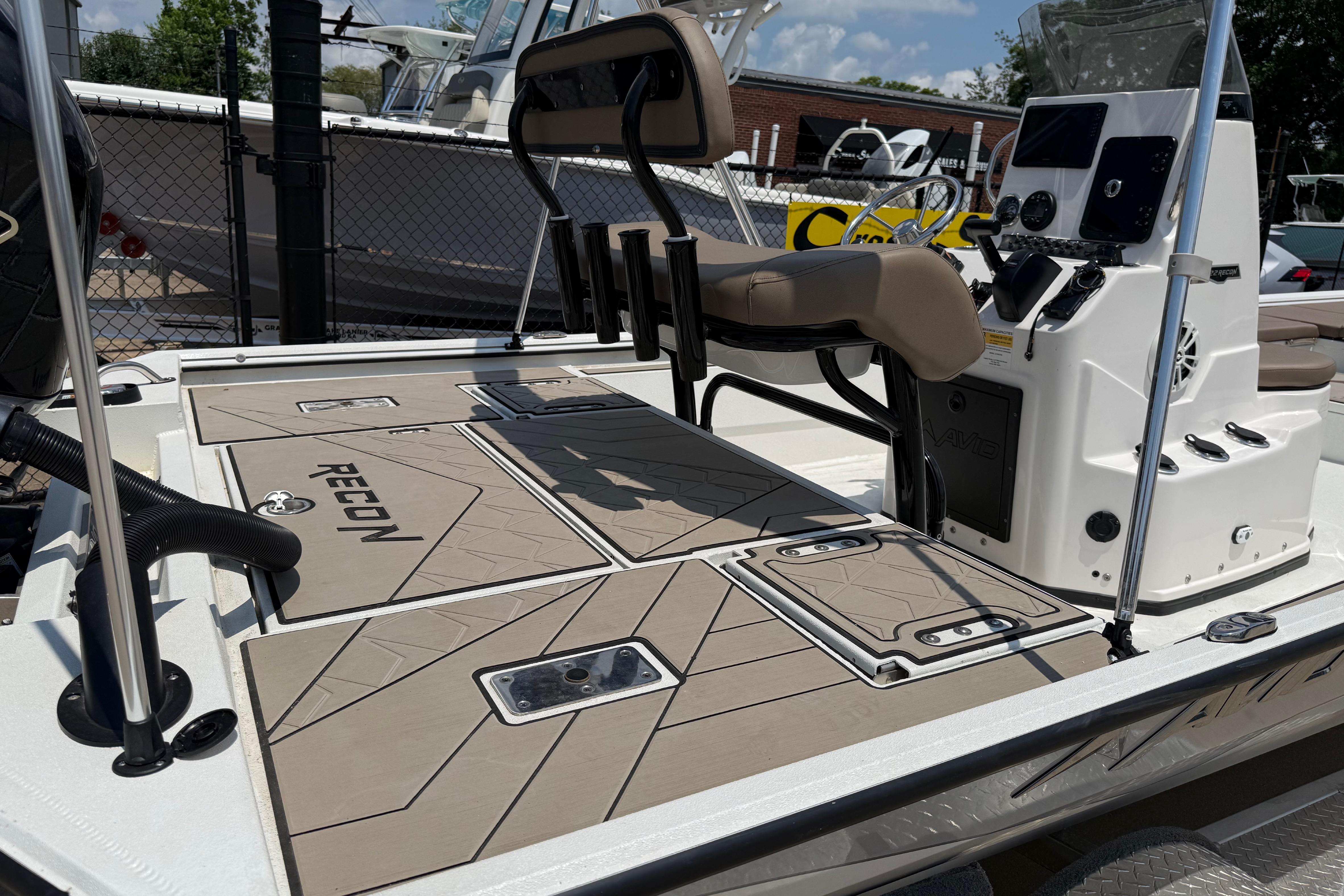 2025 Avid 22 Recon boat interior with modern console and seating.