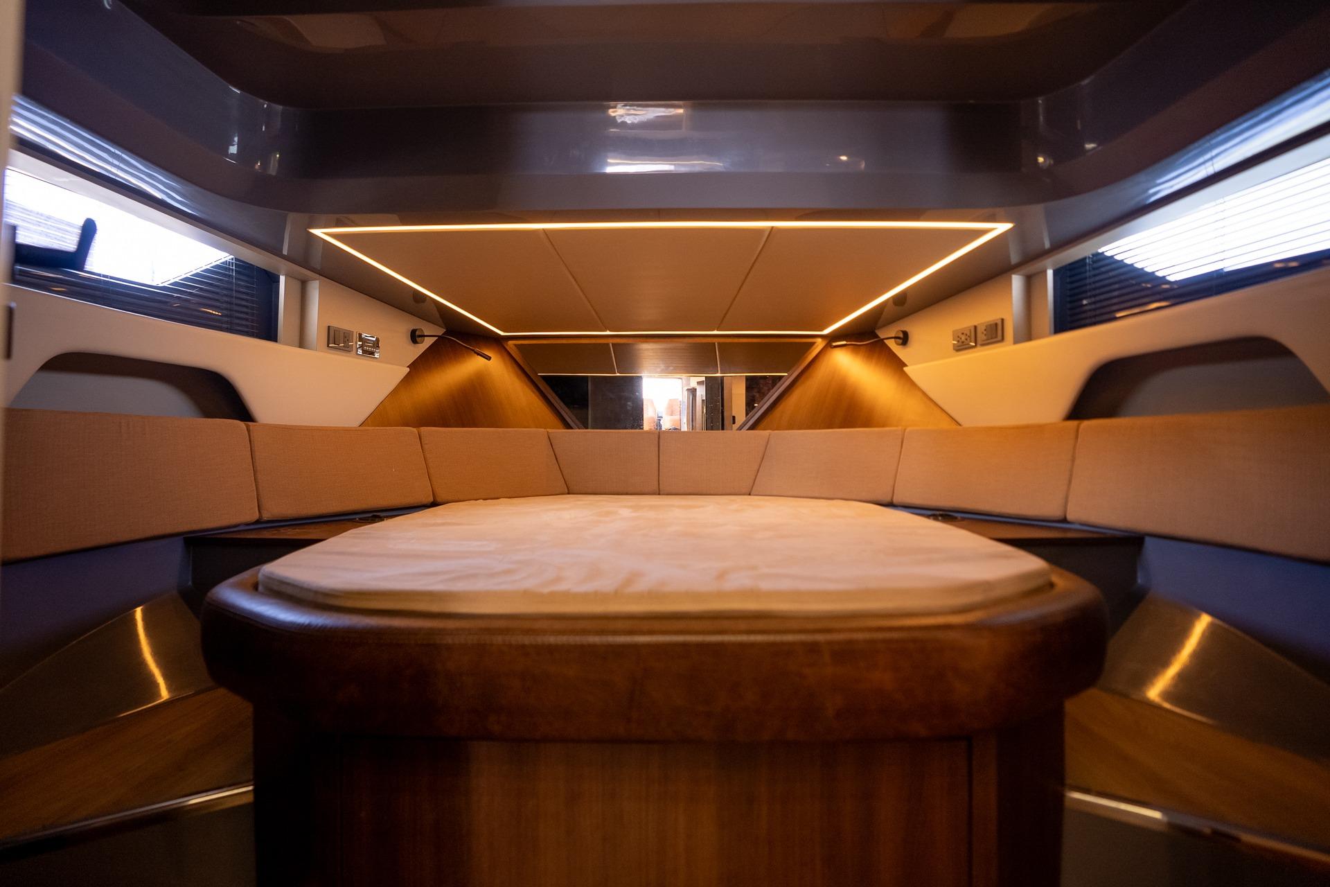 Luxurious interior of 2026 Hanover 447 yacht with modern lighting and seating.