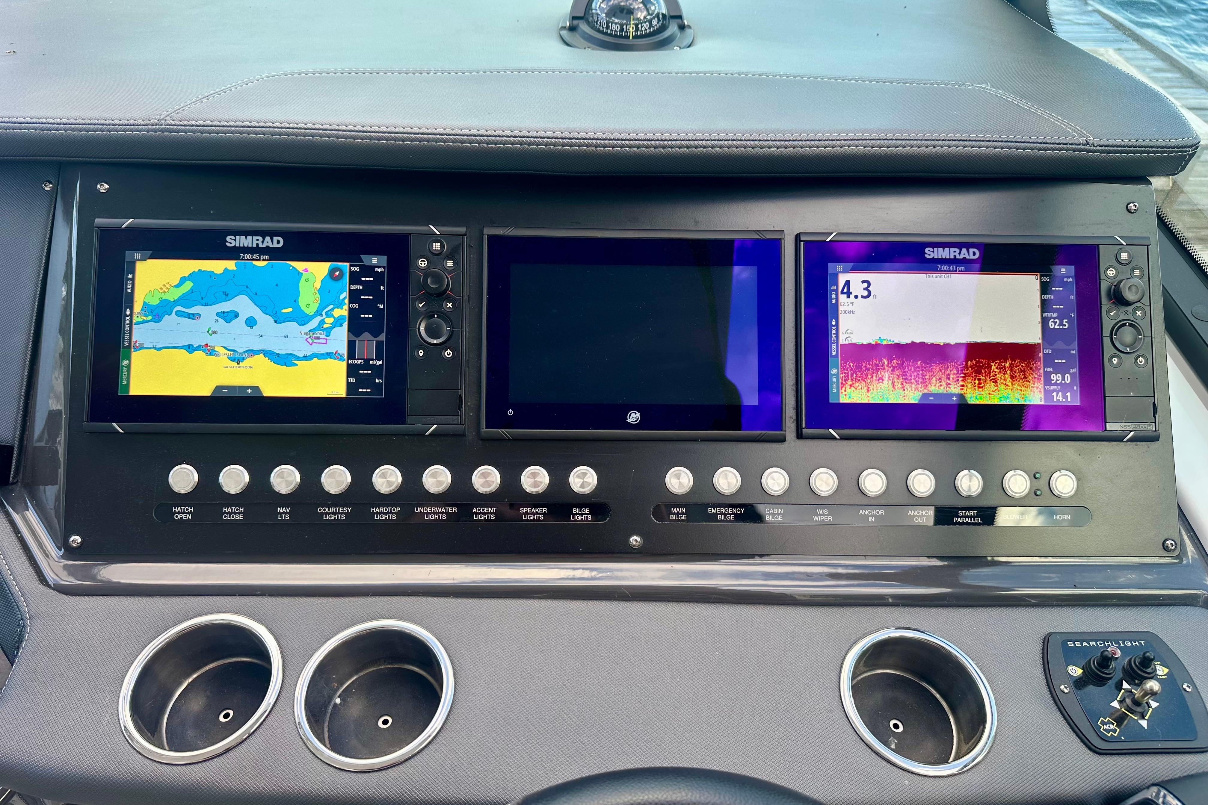 Dashboard of a 2022 Monterey 378SS Super Sport boat with navigation displays and controls.