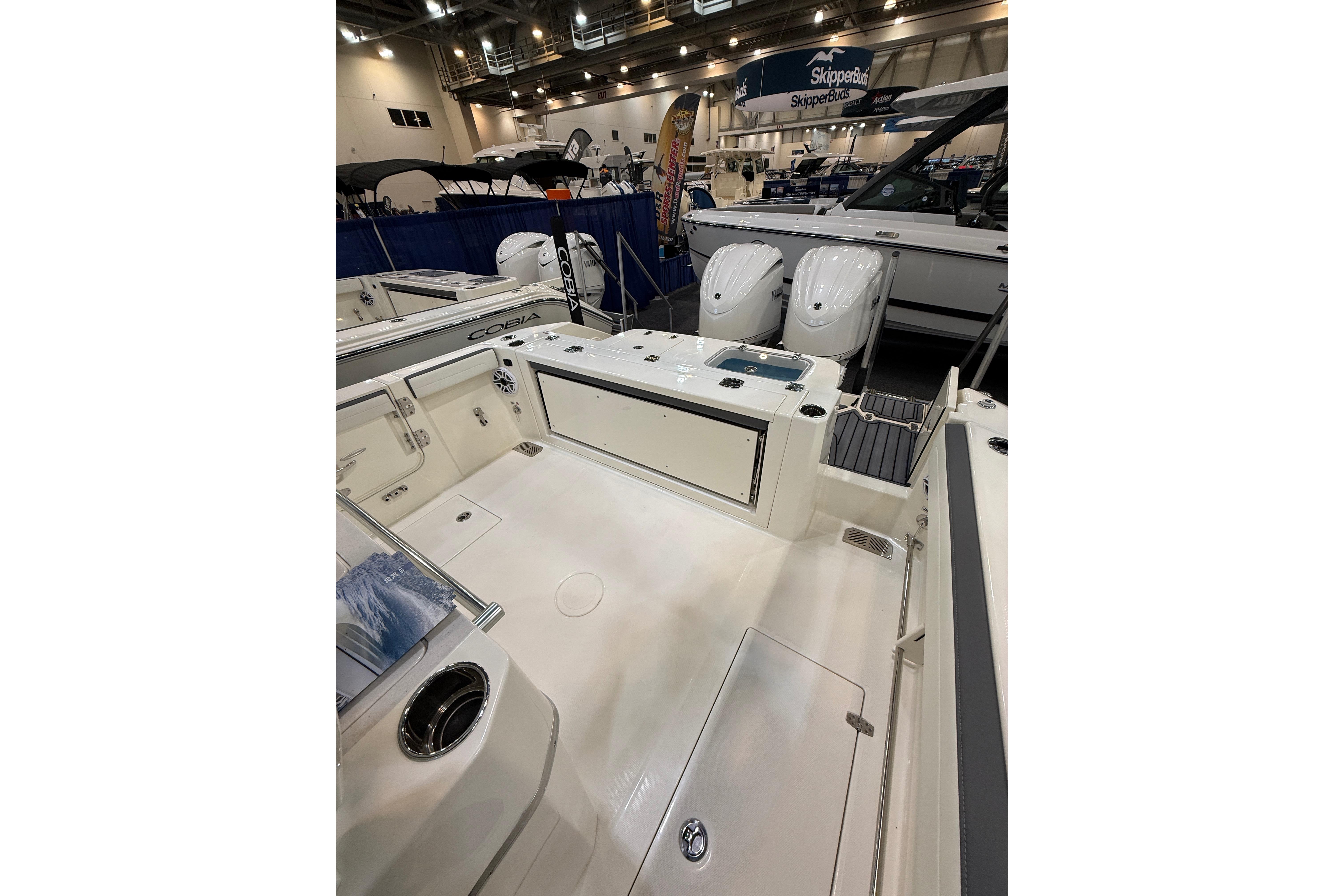 2026 Cobia 285 Center Console boat interior at a boat show.