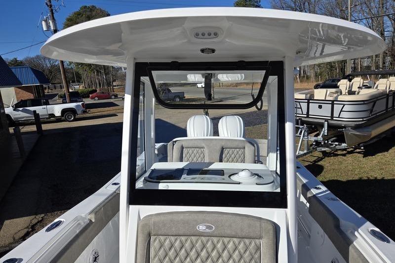 2026 Sea Hunt Ultra 275 Coffin Box boat, featuring a sleek console and seating area.