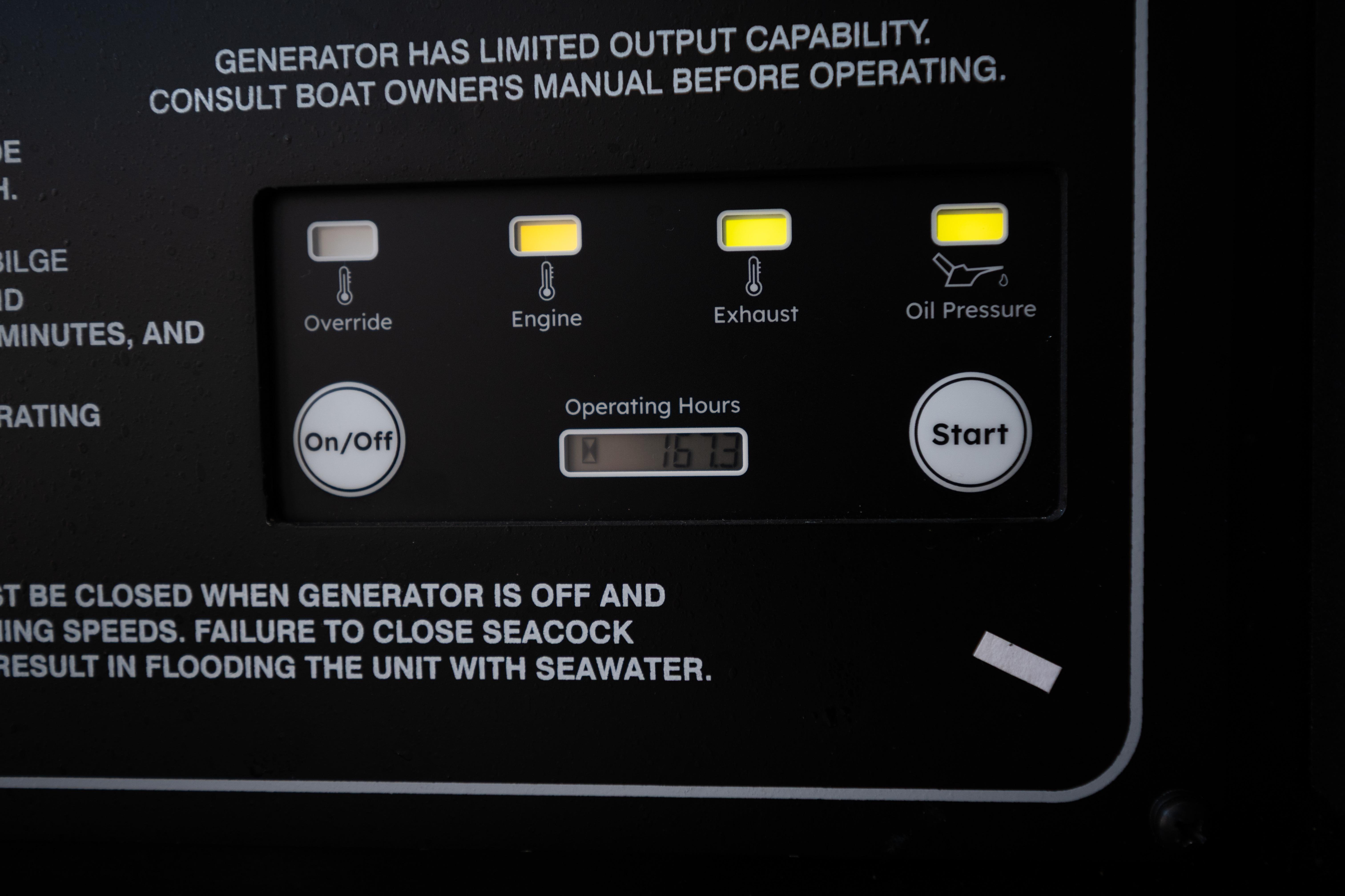 Control panel of a 2025 Grady-White Canyon 386 boat, showing generator indicators and operating hours.