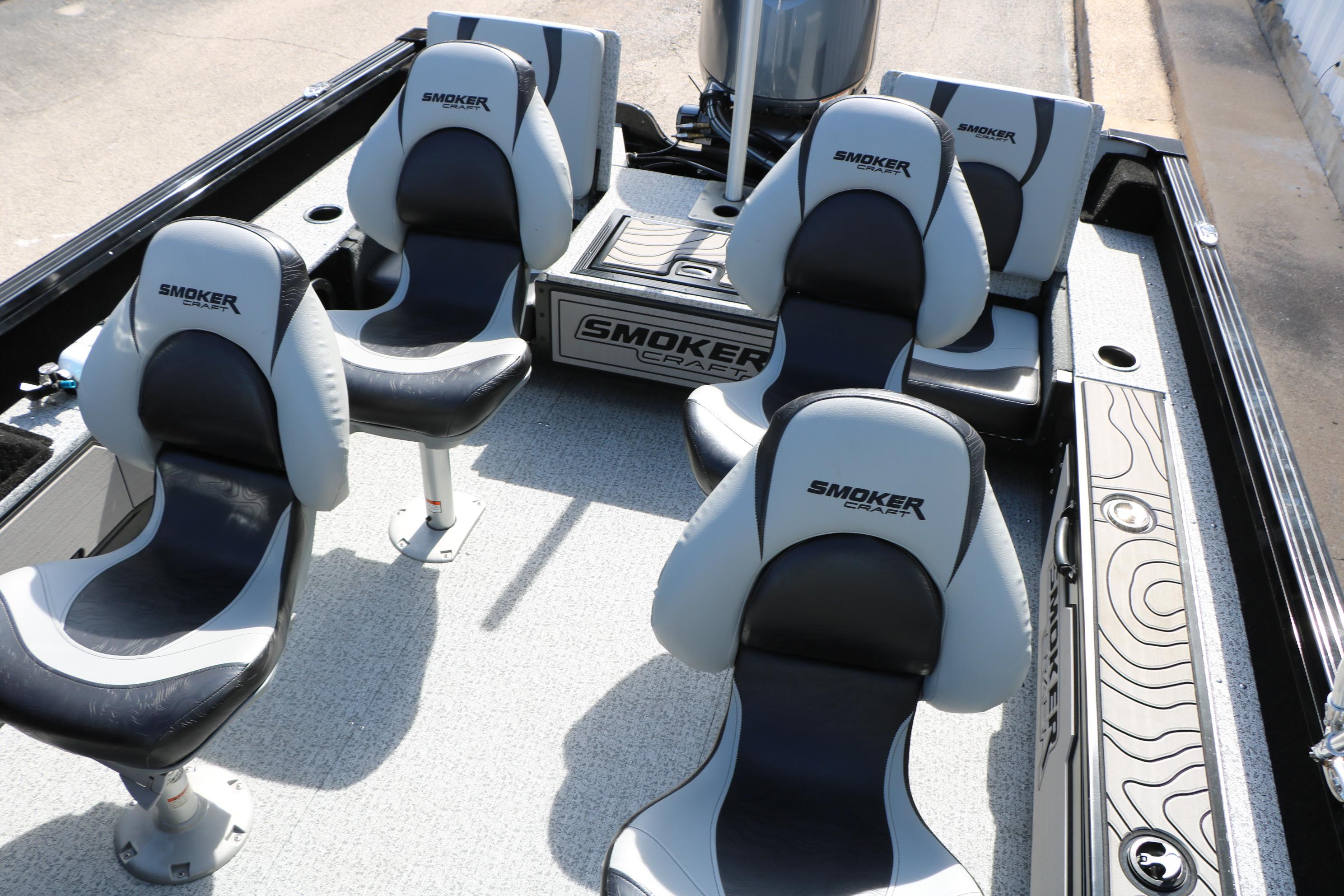 2025 Smoker Craft Adventurer 188 DC boat interior with four cushioned seats.