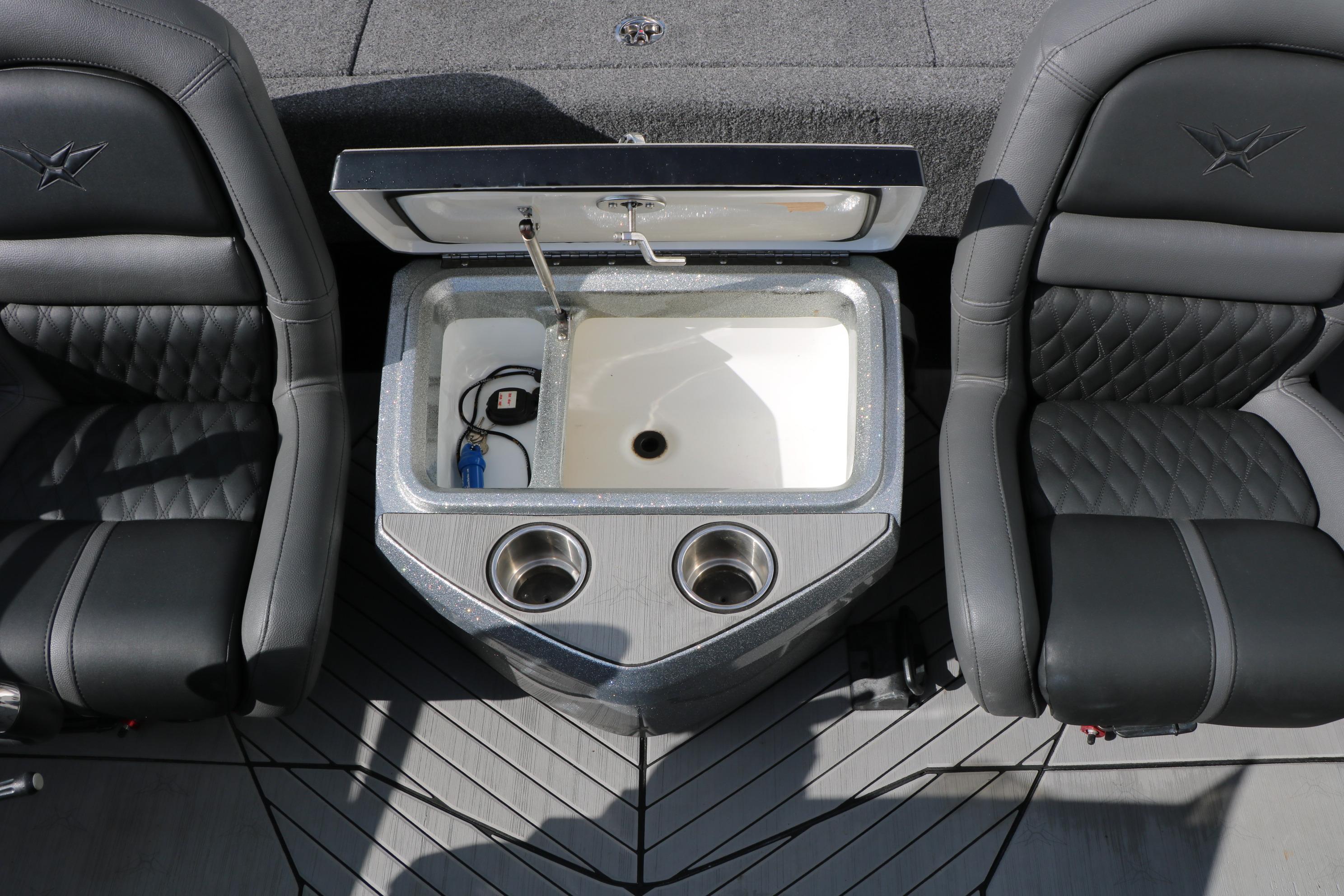 2022 Vexus VX21 boat interior with livewell and cup holders between two seats.