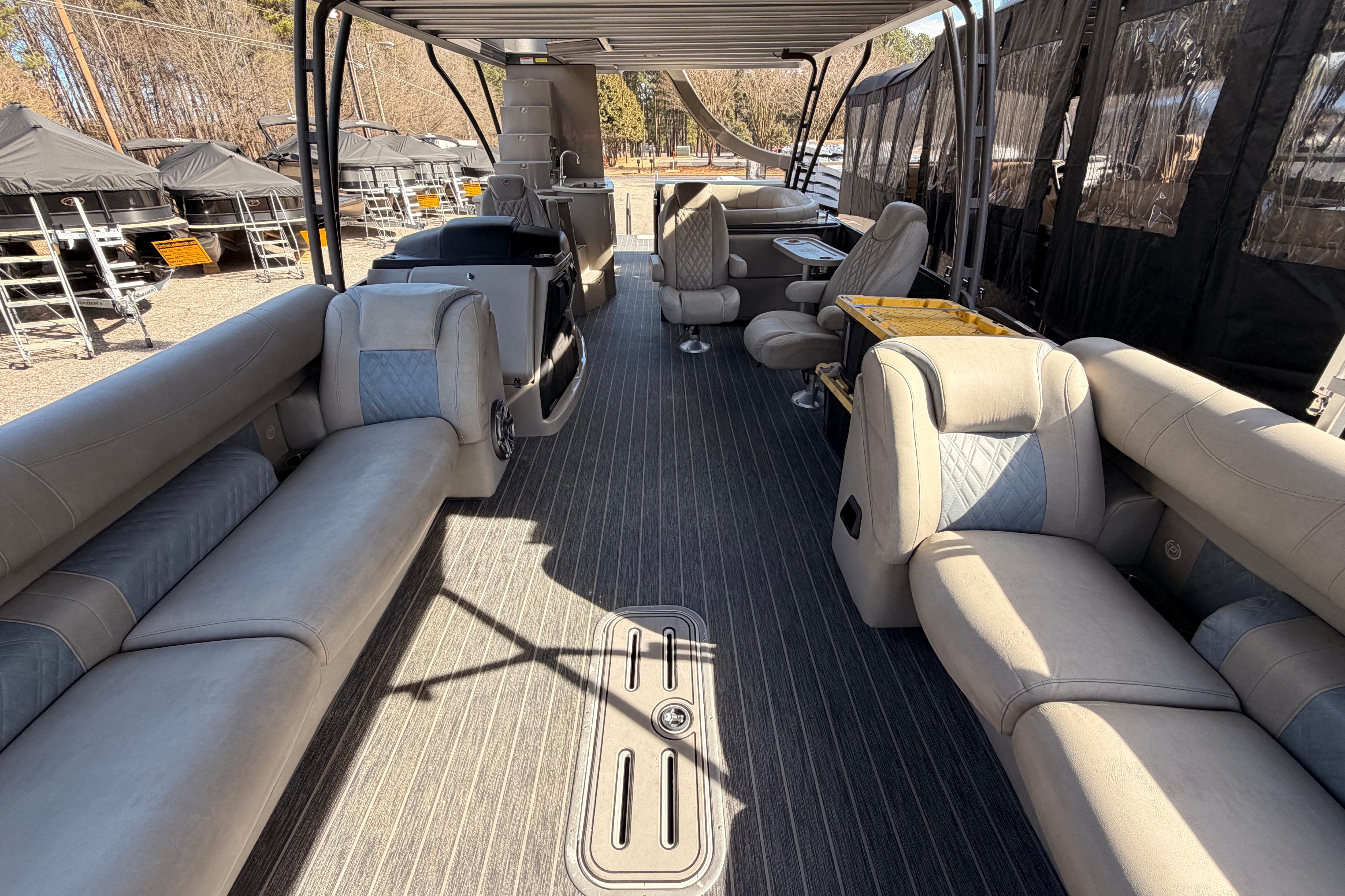 Interior of 2022 Premier 350 Escalante pontoon boat with luxurious seating and modern design.