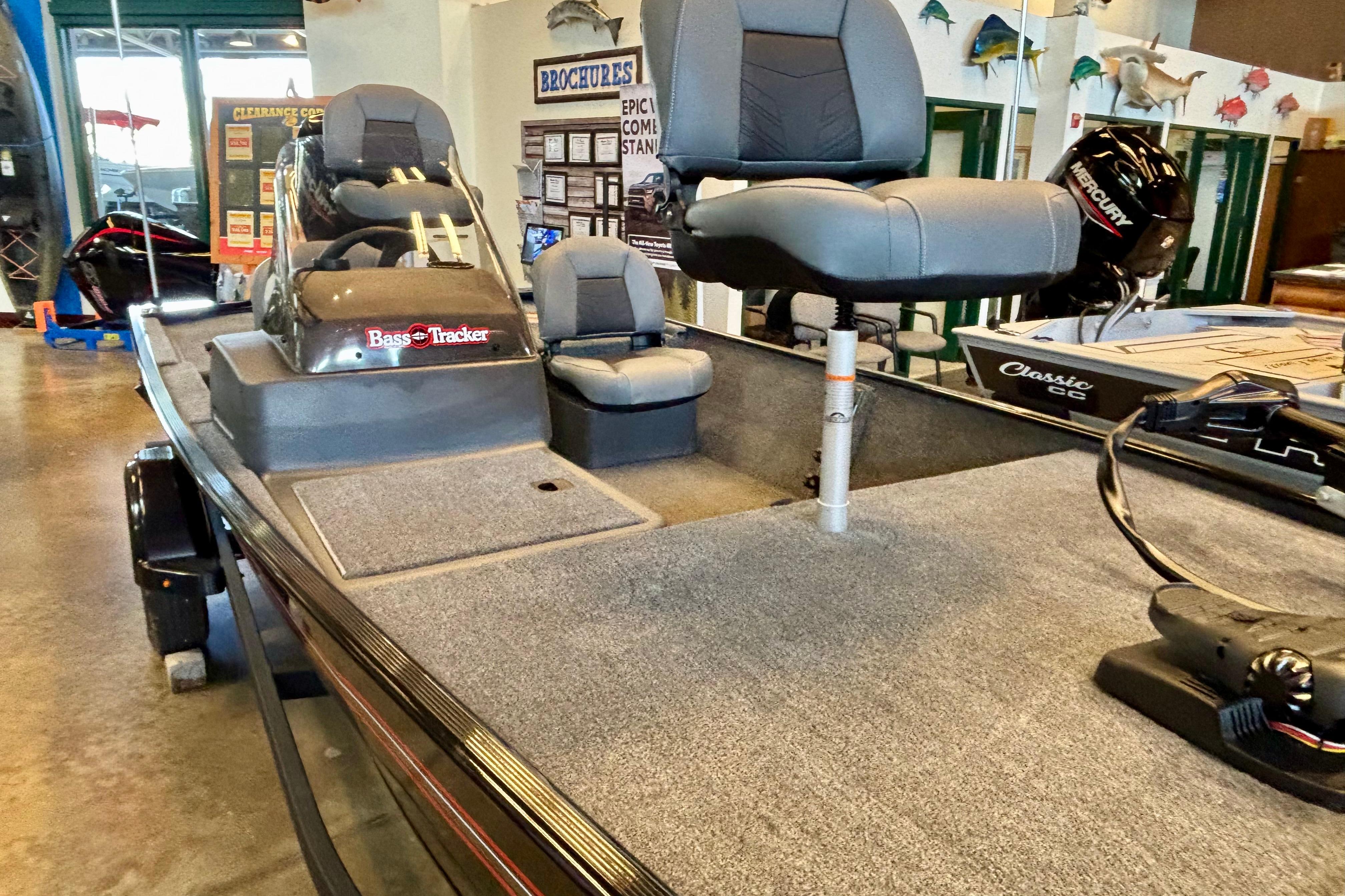 2026 Tracker Bass Tracker Classic XL boat interior with seating and steering console.