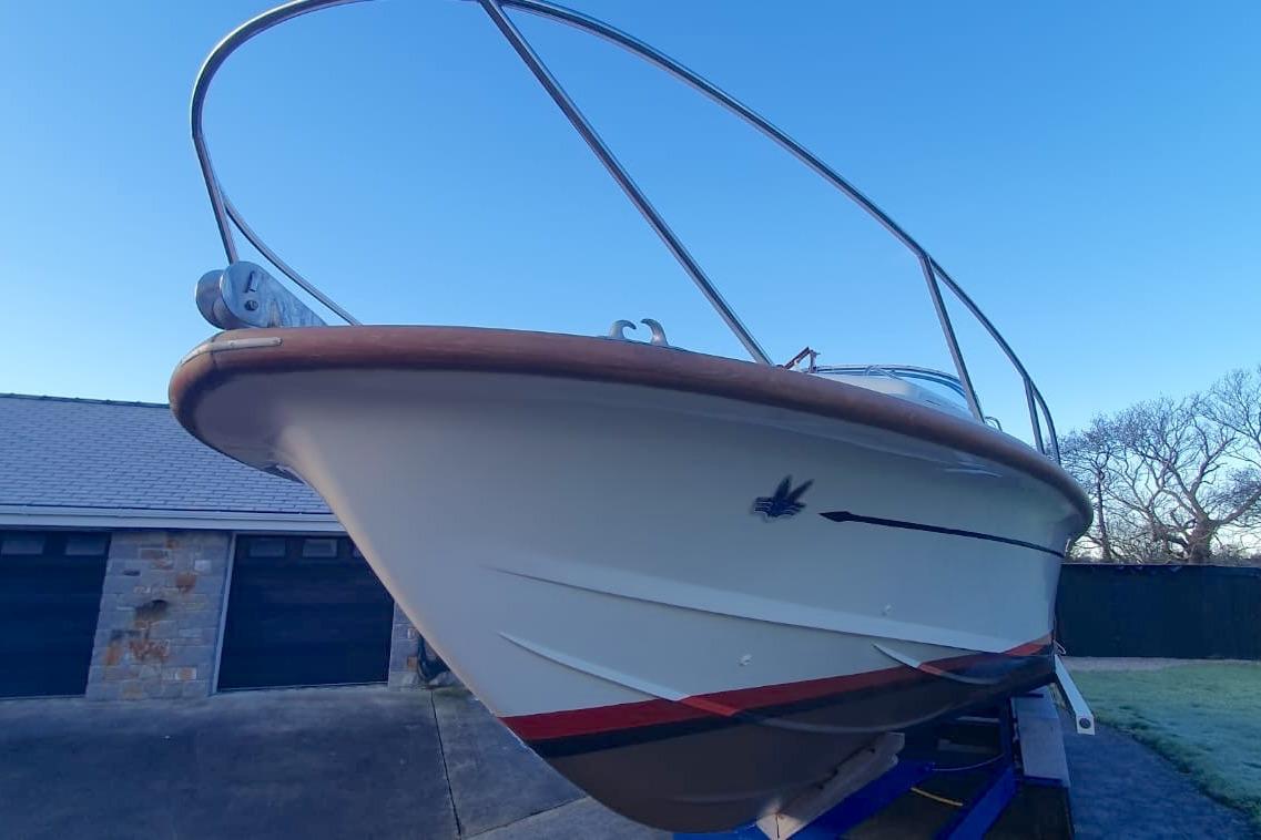 Fairey Spearfish MKIII boat from 1989 on a trailer, viewed from the bow.