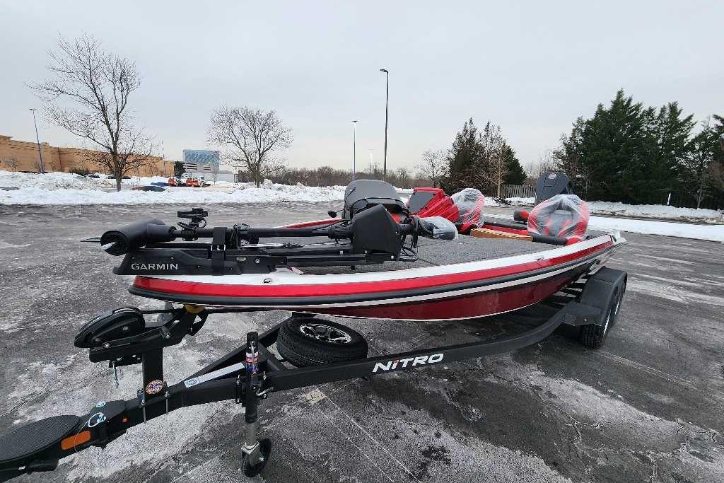 2026 Nitro Z19 XL Pro boat on trailer in snowy parking lot.