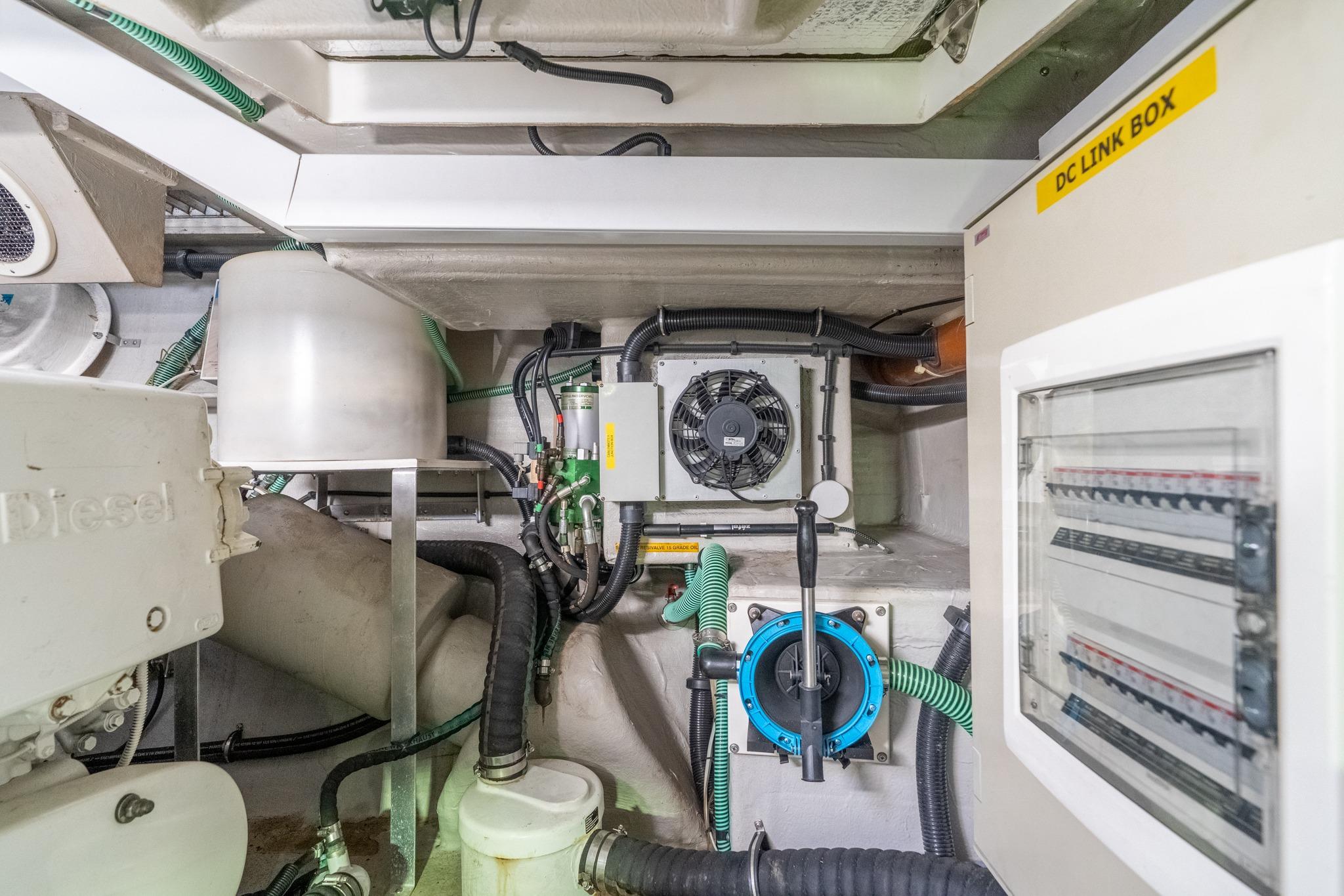 Engine room of 2009 Sunseeker Manhattan 60 yacht, featuring electrical systems and components.