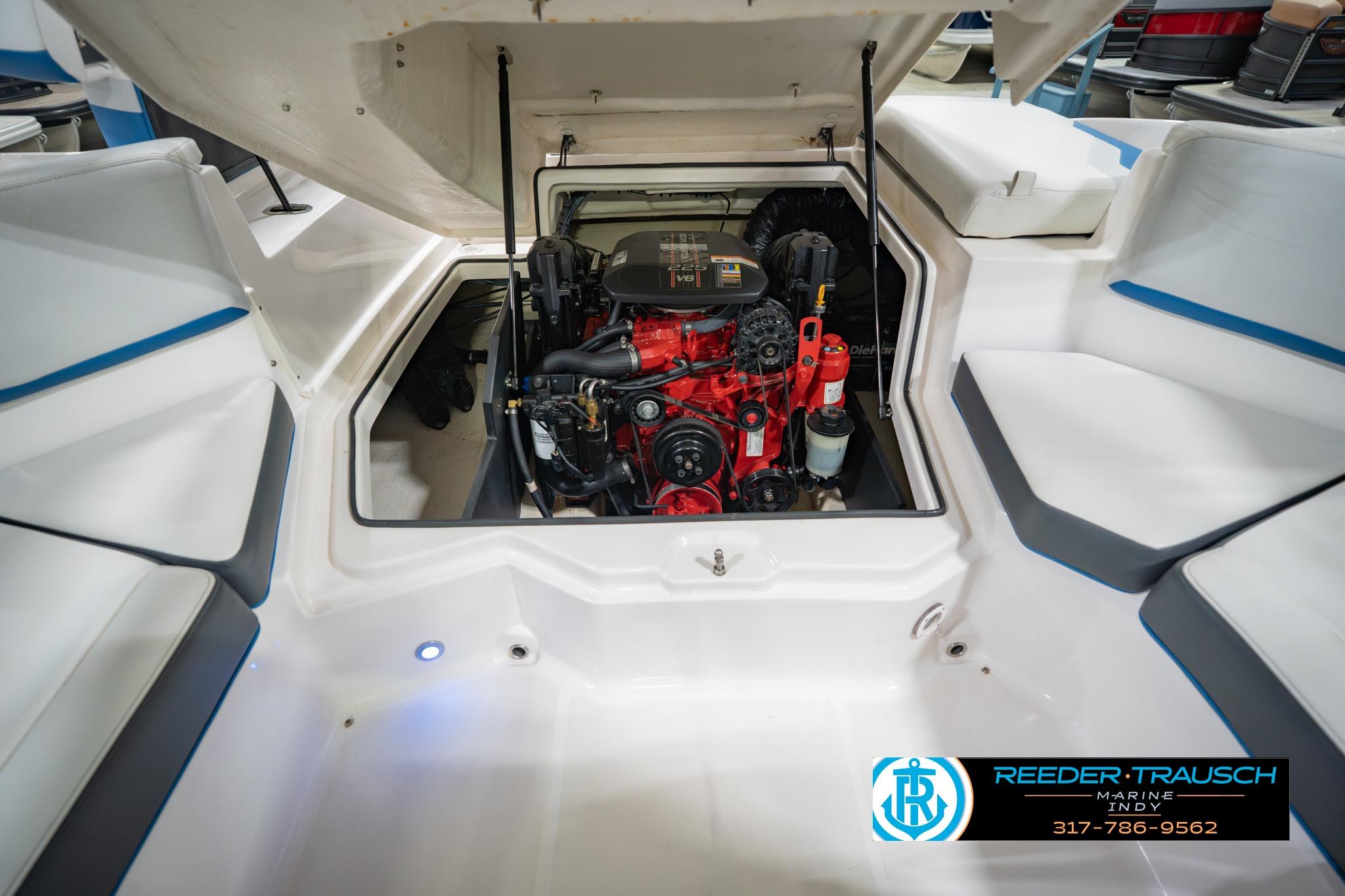 2015 Regal 2000 ESX Bowrider engine compartment with visible red engine components.