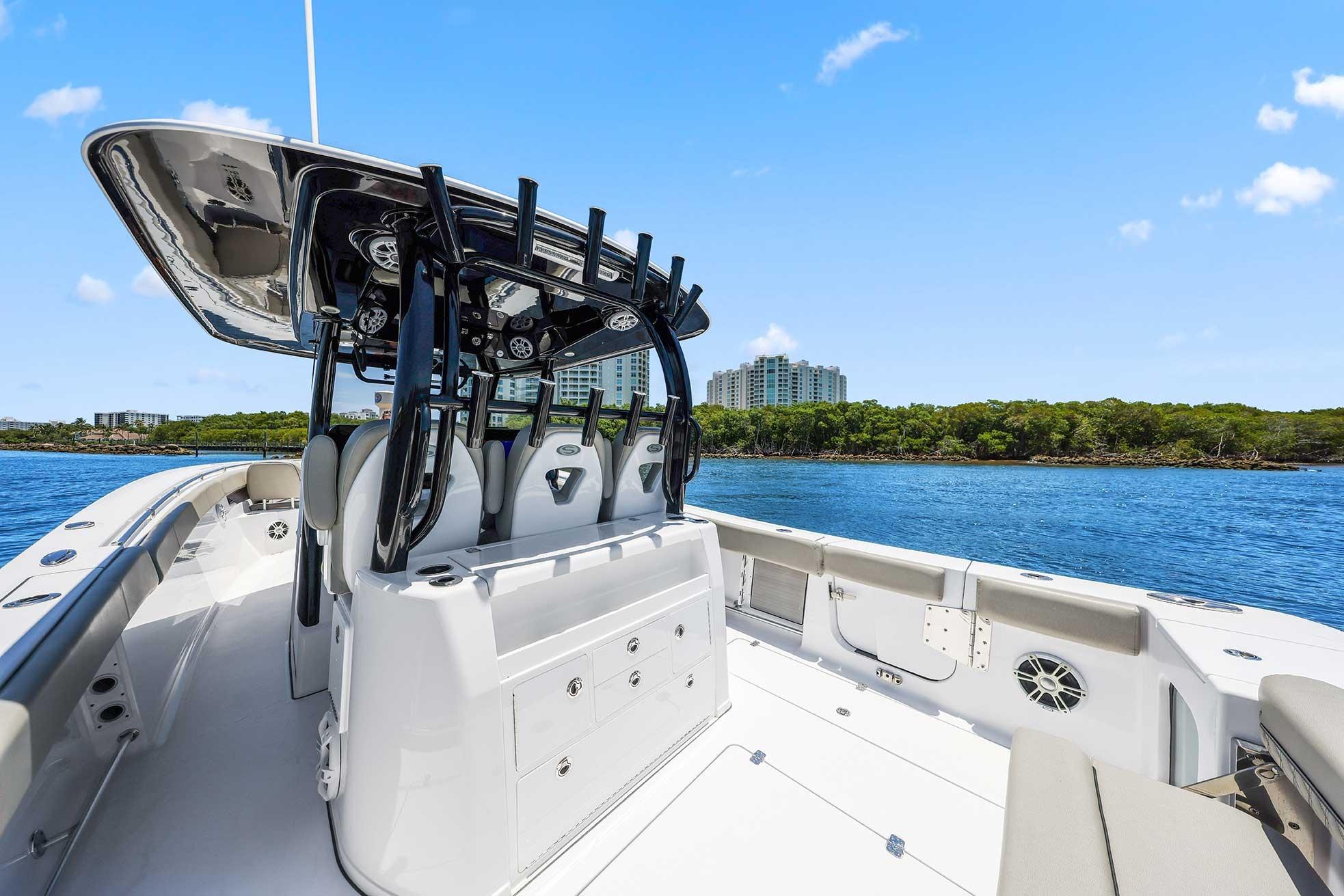 2024 Sportsman Open 352 Center Console boat on water, featuring sleek design and spacious deck.