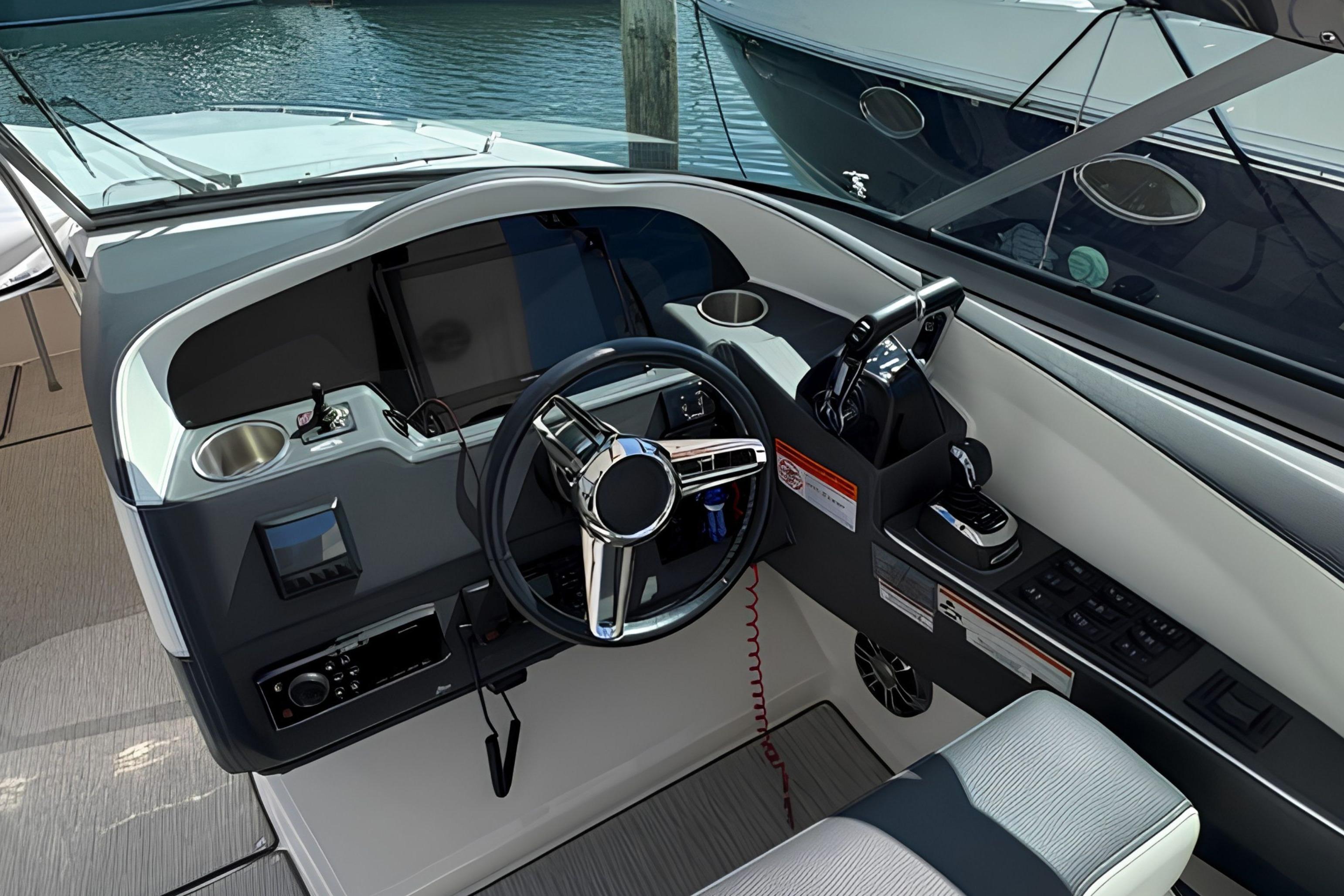 Cockpit of 2020 Regal 33 OBX boat with modern steering and controls.