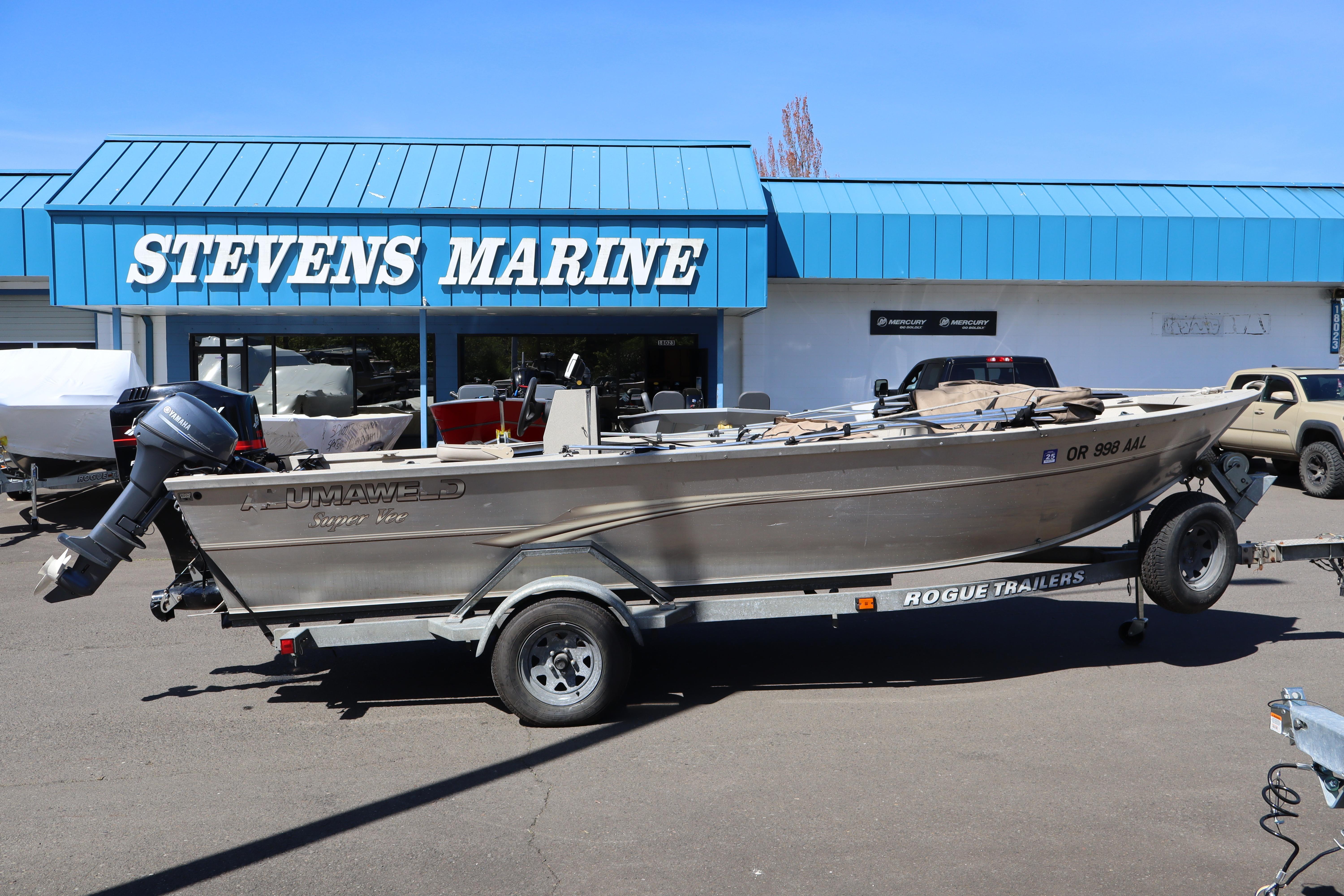 2002 Alumaweld SUPER VEE LS boat on trailer at Stevens Marine dealership.