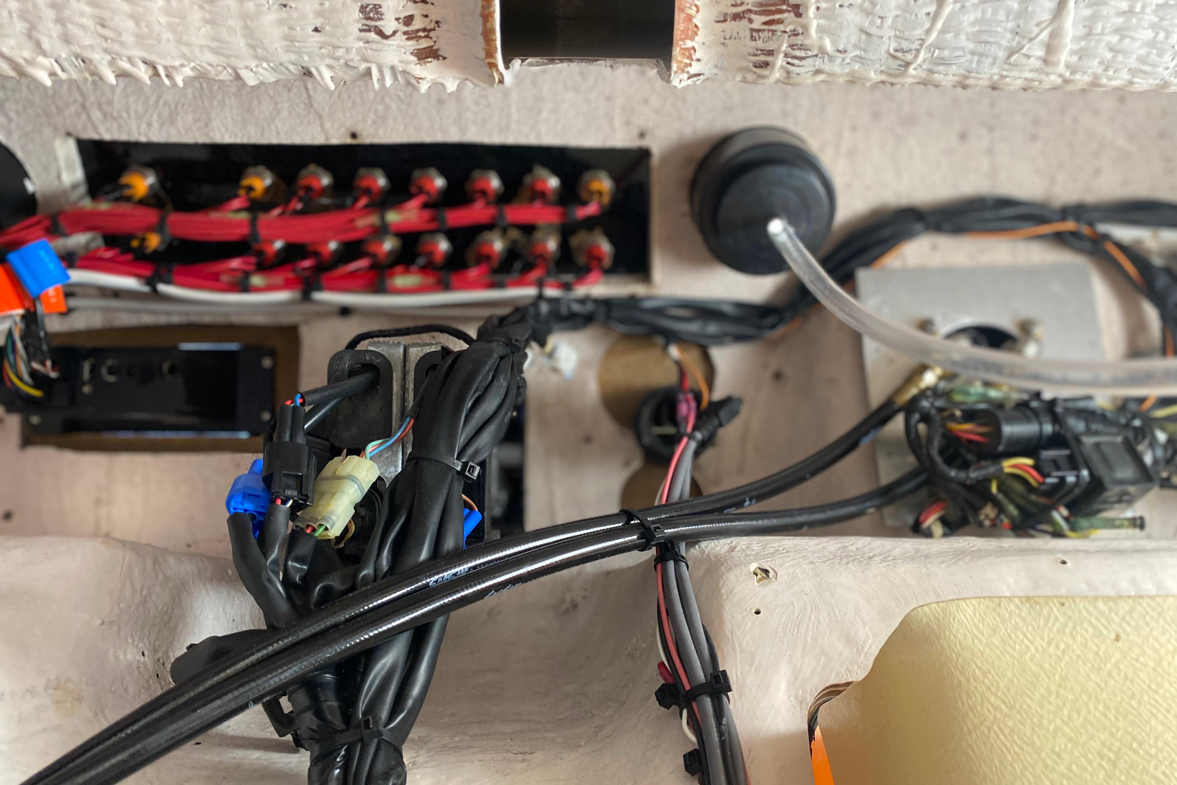 Electrical wiring and components inside a 2004 Grady-White Canyon 283 boat.