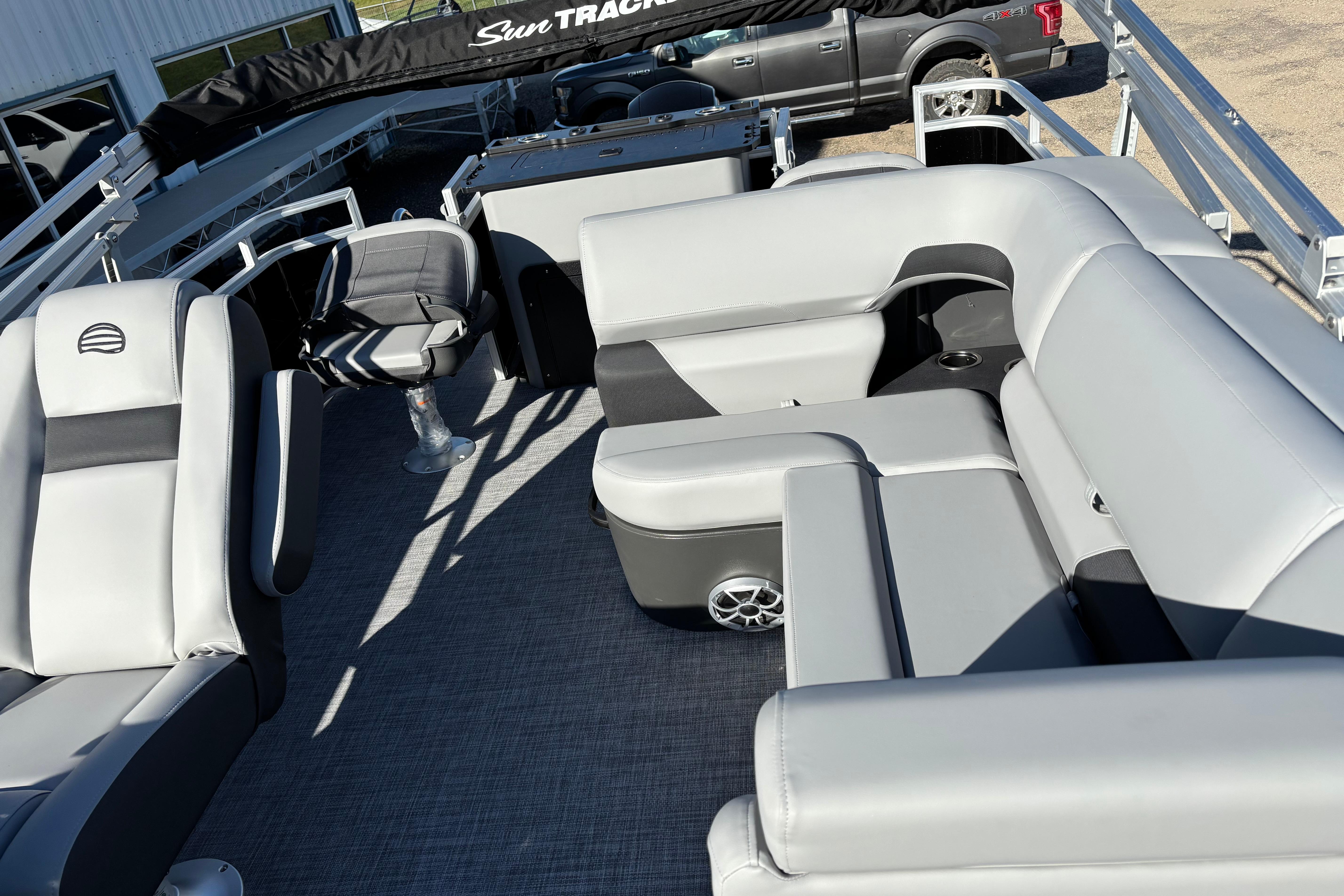 2026 Sun Tracker SportFish 22 XP3 pontoon boat with spacious seating and modern design.