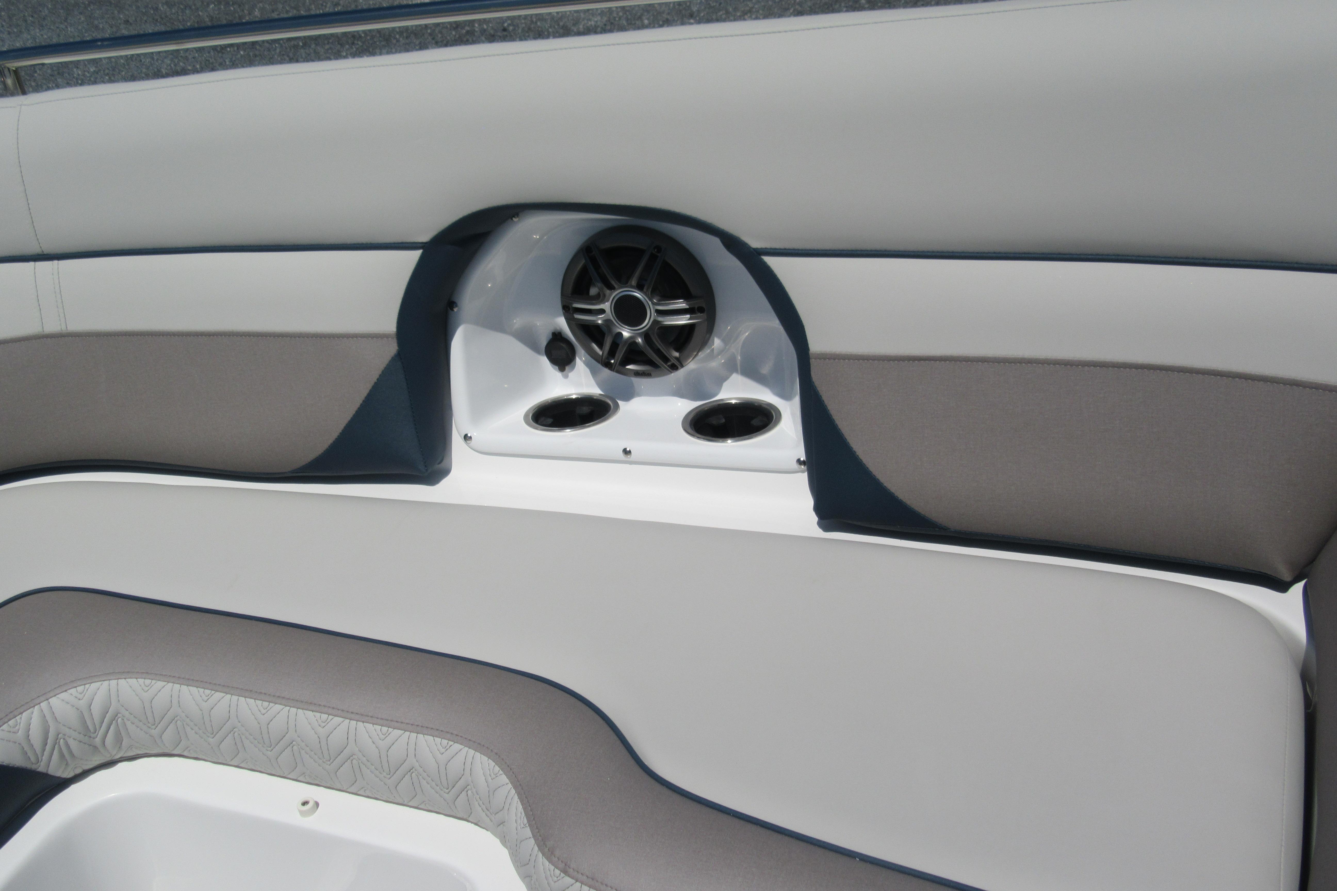 Interior seating and speaker system of 2027 Hurricane SunDeck 2486 OB boat.