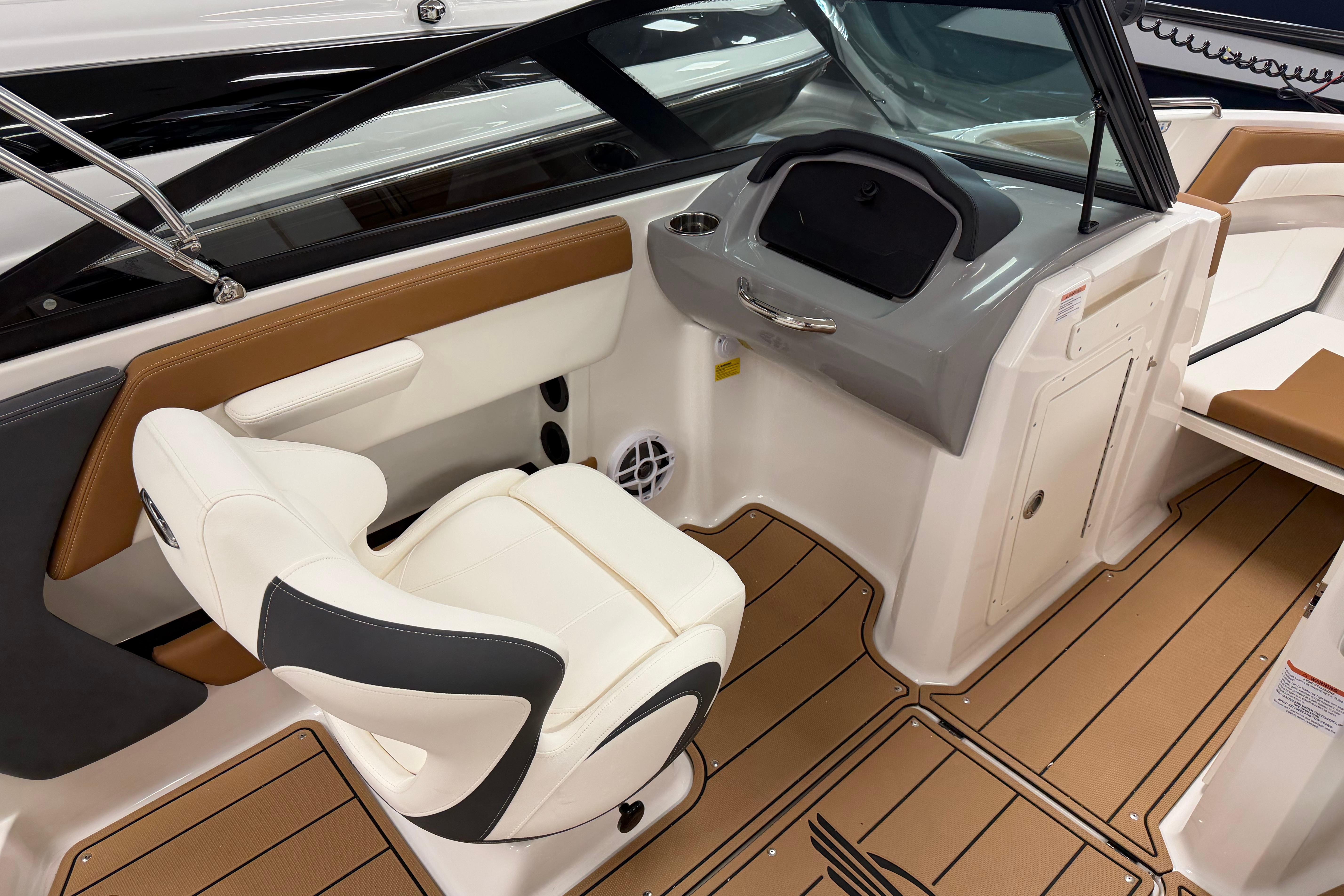 2026 Chaparral 21 SSi Ski & Fish boat interior with sleek seating and modern dashboard.