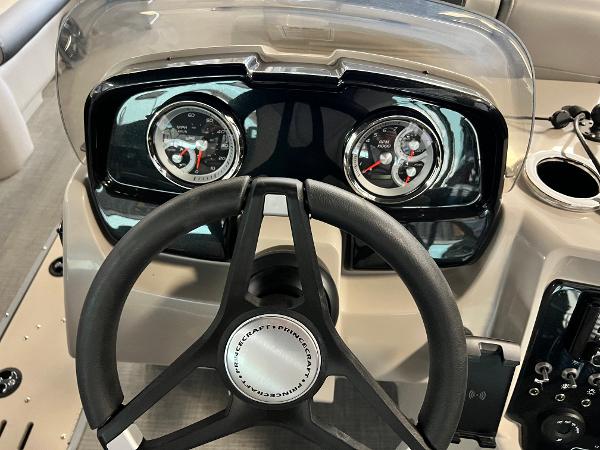 2024 Princecraft Quorum 23 RL dashboard with steering wheel and gauges.