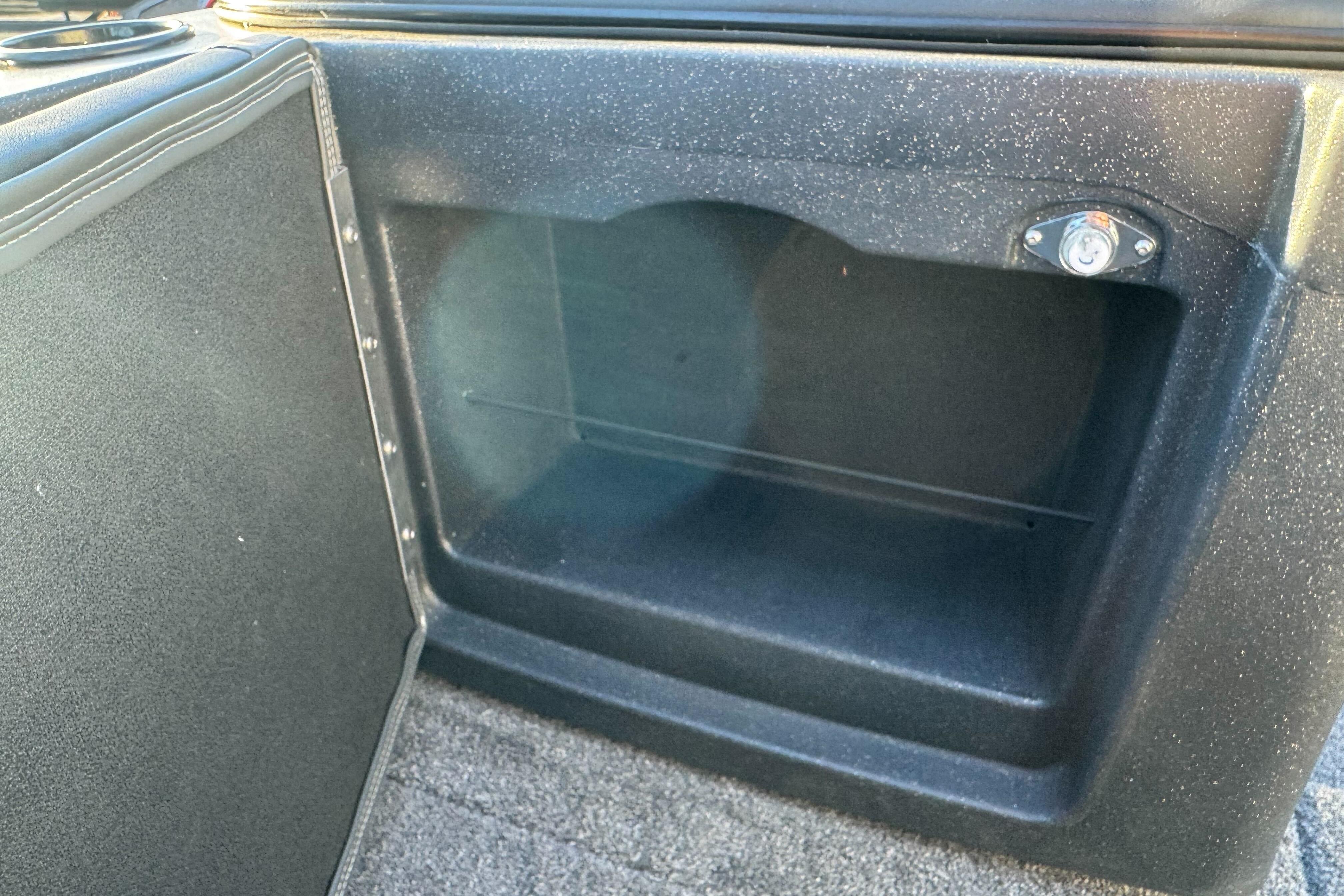 Storage compartment in 2026 Tracker Targa V-18 WT boat, featuring durable interior design.