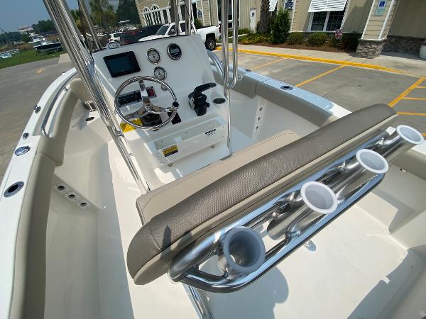 2024 Key West 203 FS boat interior with console and seating.
